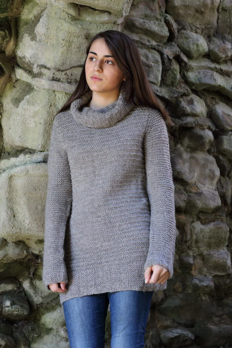 Cara by Gudrun Johnston This sweater is worked bottom up in the round, separating at the underarms to work the front and back flat. Shoulders are joined with a Three Needle Cast Off and stitches are then picked up around the armhole to work the sleeve. The sleeve cap is shaped using short rows. Yarn: Baa Ram Ewe's Dovestone Natural Aran (170m in 100g) Yarn Quantities: 1075 - 1900 yards (983 - 1737 m) Needles: 6.5mm circulars in 40, 60 and 80cm lengths plus DPNs, 5.5mm x 60cm circular Notions: Stitch markers