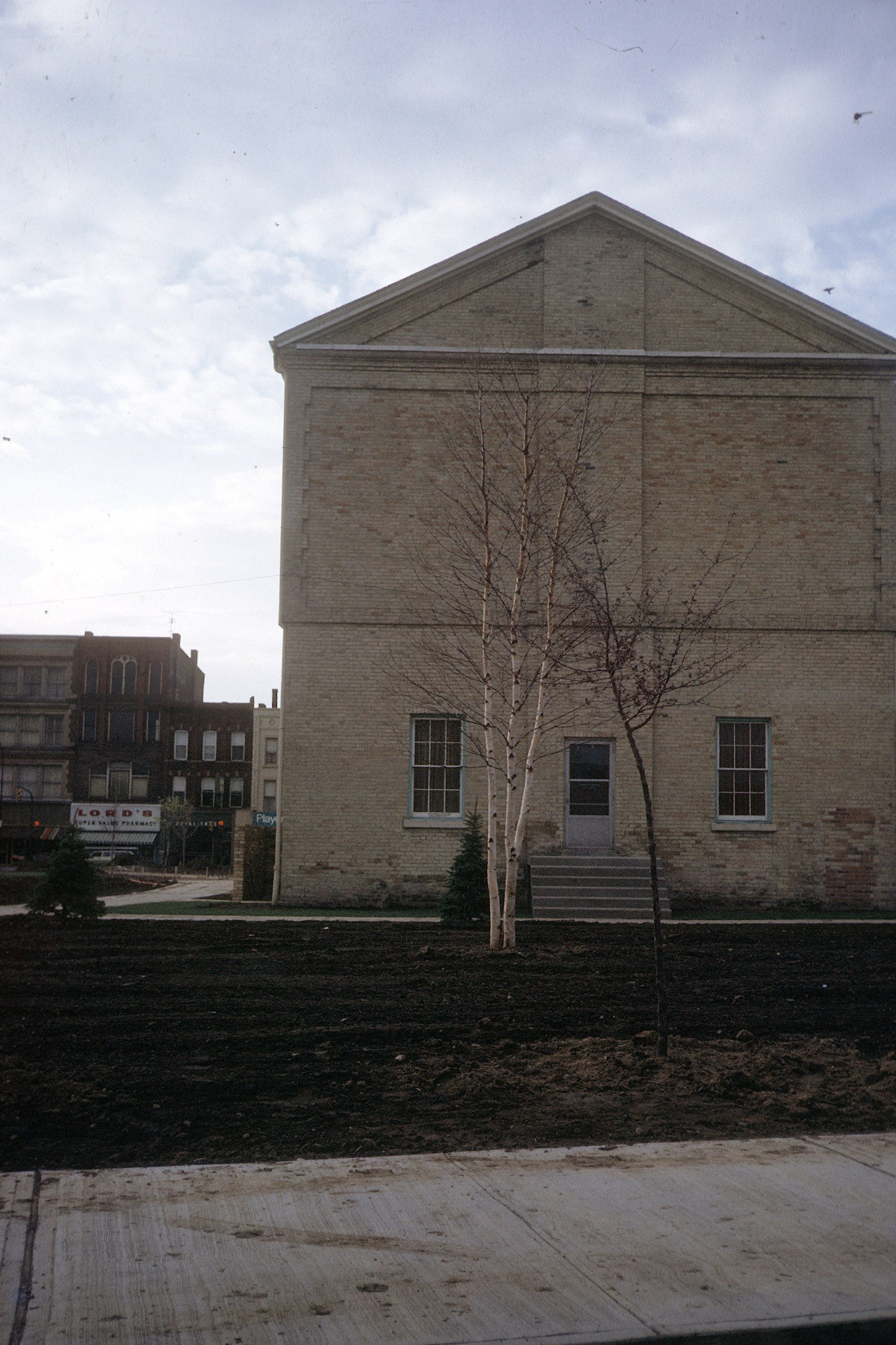 Gardens and paths in Museum Square beside the Woodstock Museum.