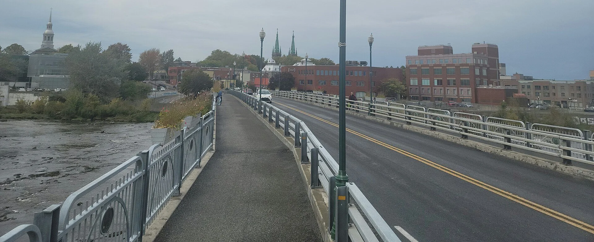 The walkway of the Bourdages Street bridge over the Yamaska River, looking toward old Saint-Hyacinthe, Quebec.
