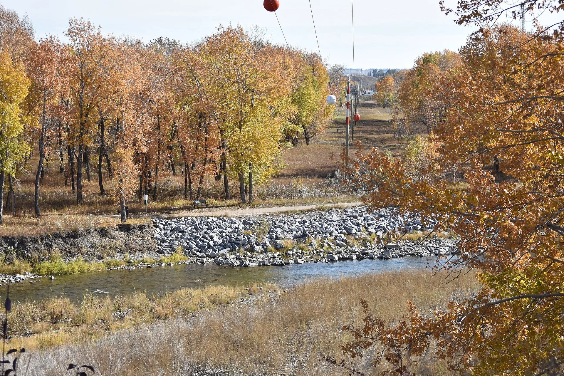 The Sheep River flowing through Okotoks on a fall day.
