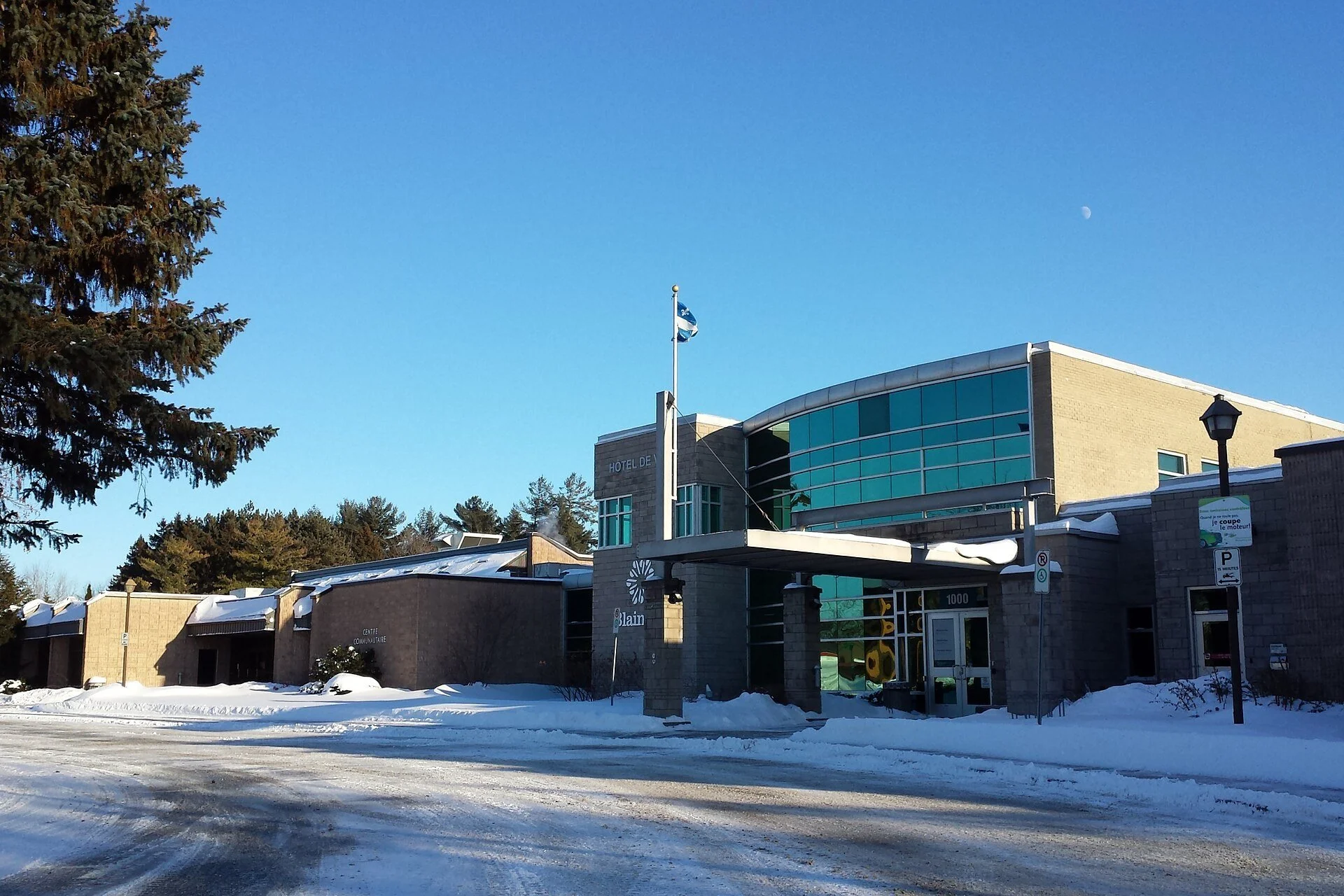 Blainville City Hall on chemin du Plan-Bouchard under a clear winter sky in Blainville, Quebec.
