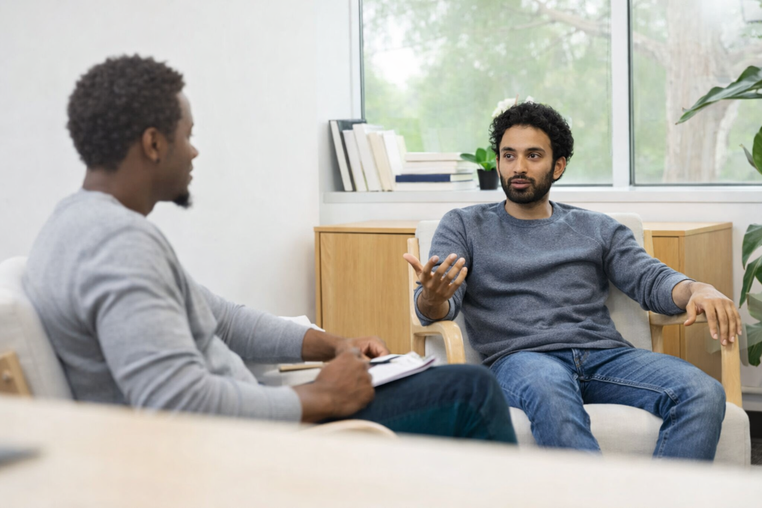 sex addiction therapy session between two men in waterloo Kitchener office