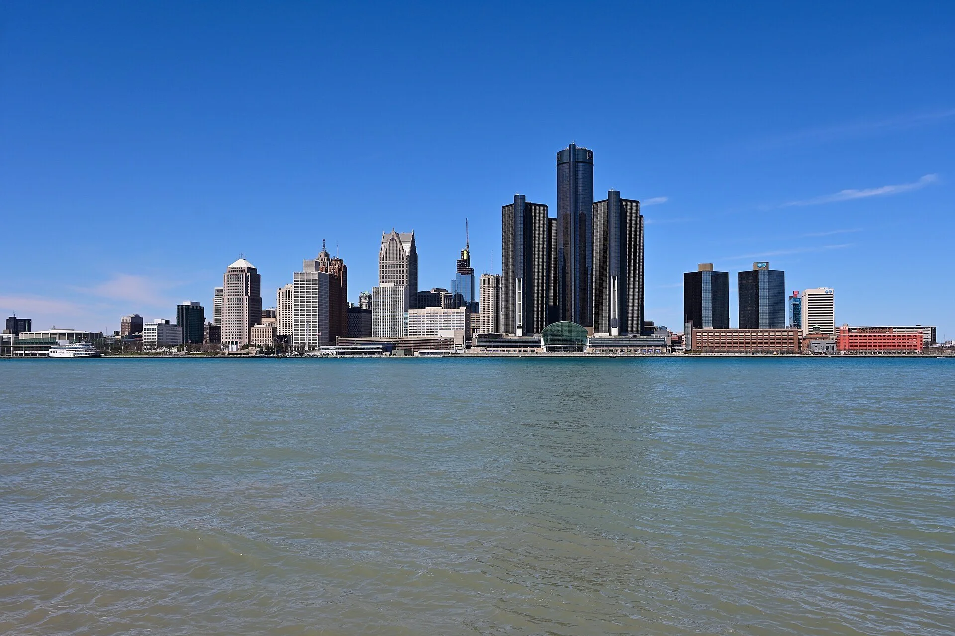 The Detroit skyline across the Detroit River, seen from the Windsor riverfront on a clear day.