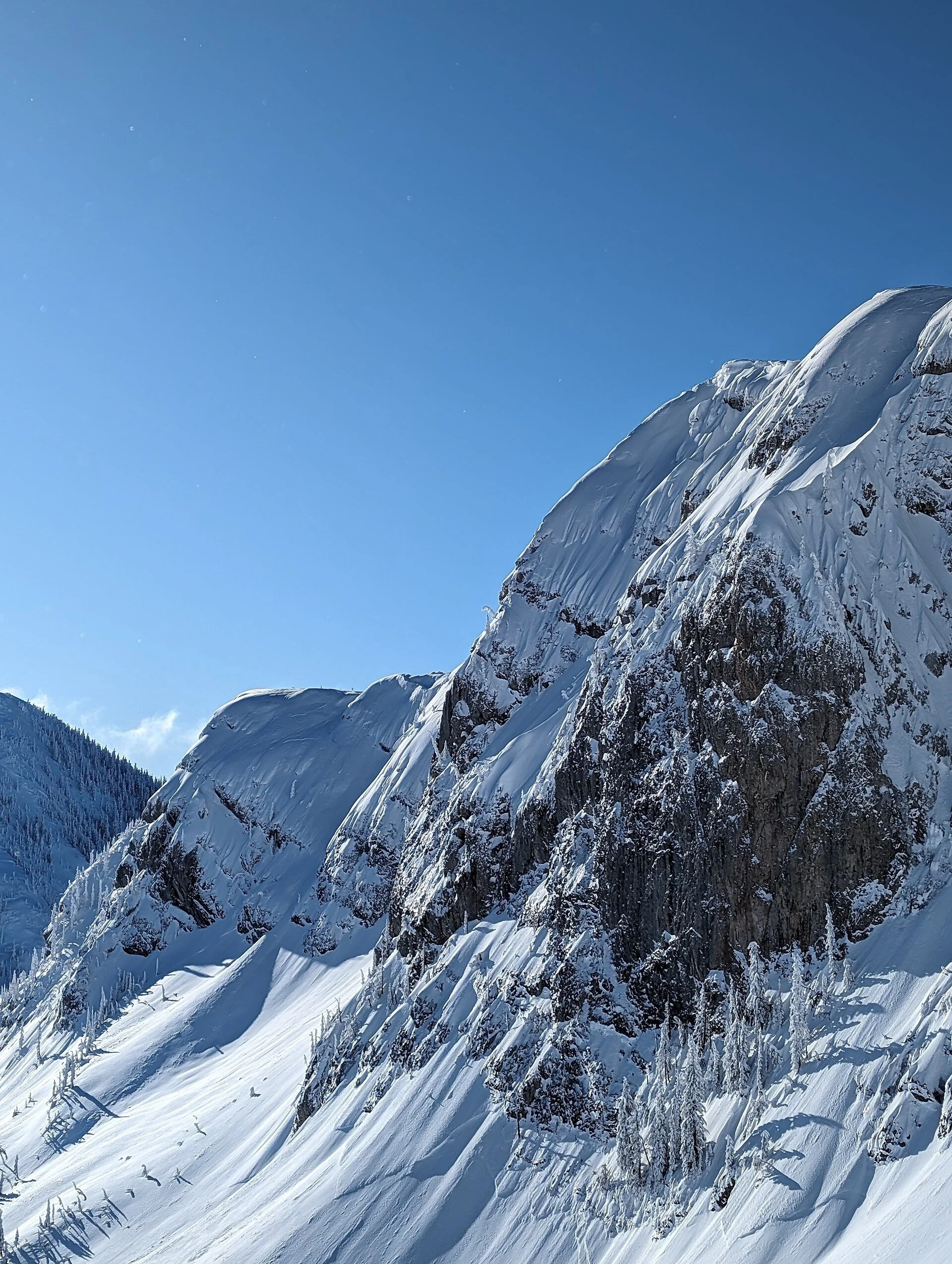 A snow covered peak at Fernie Alpine Resort in winter.