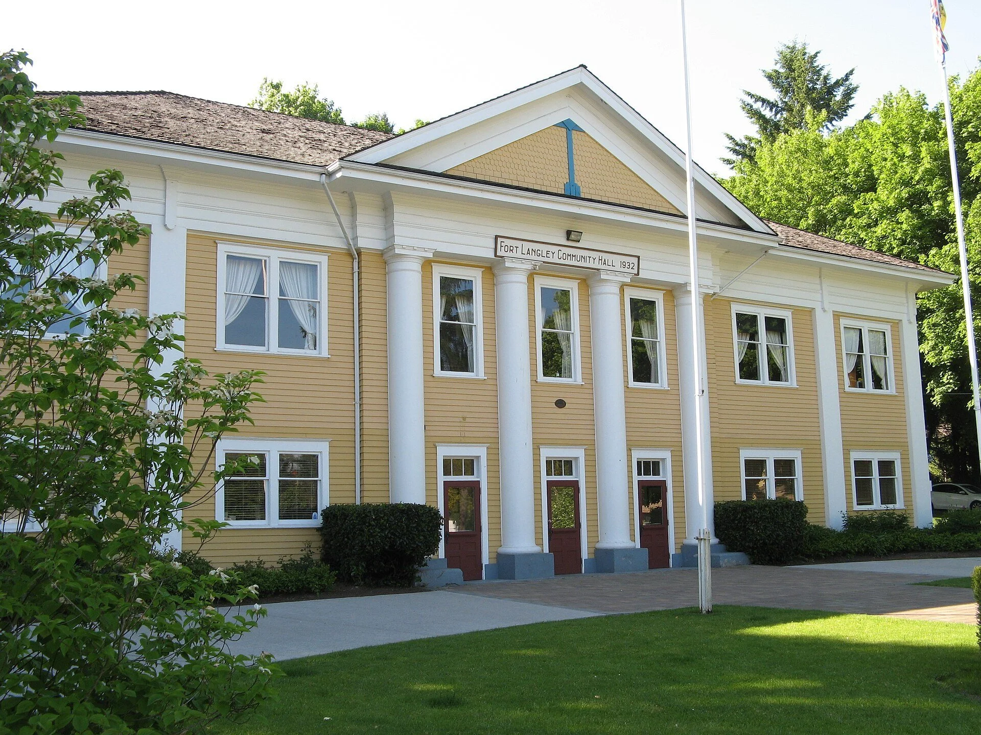The pale yellow Fort Langley Community Hall on Glover Road.