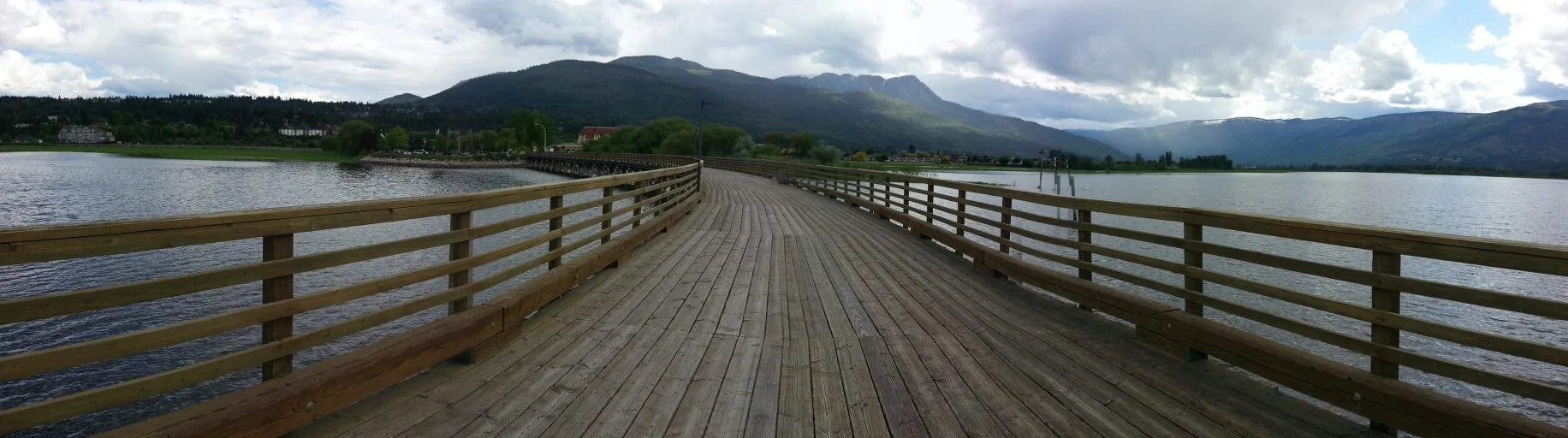 The long wooden wharf on Shuswap Lake in Salmon Arm, British Columbia.