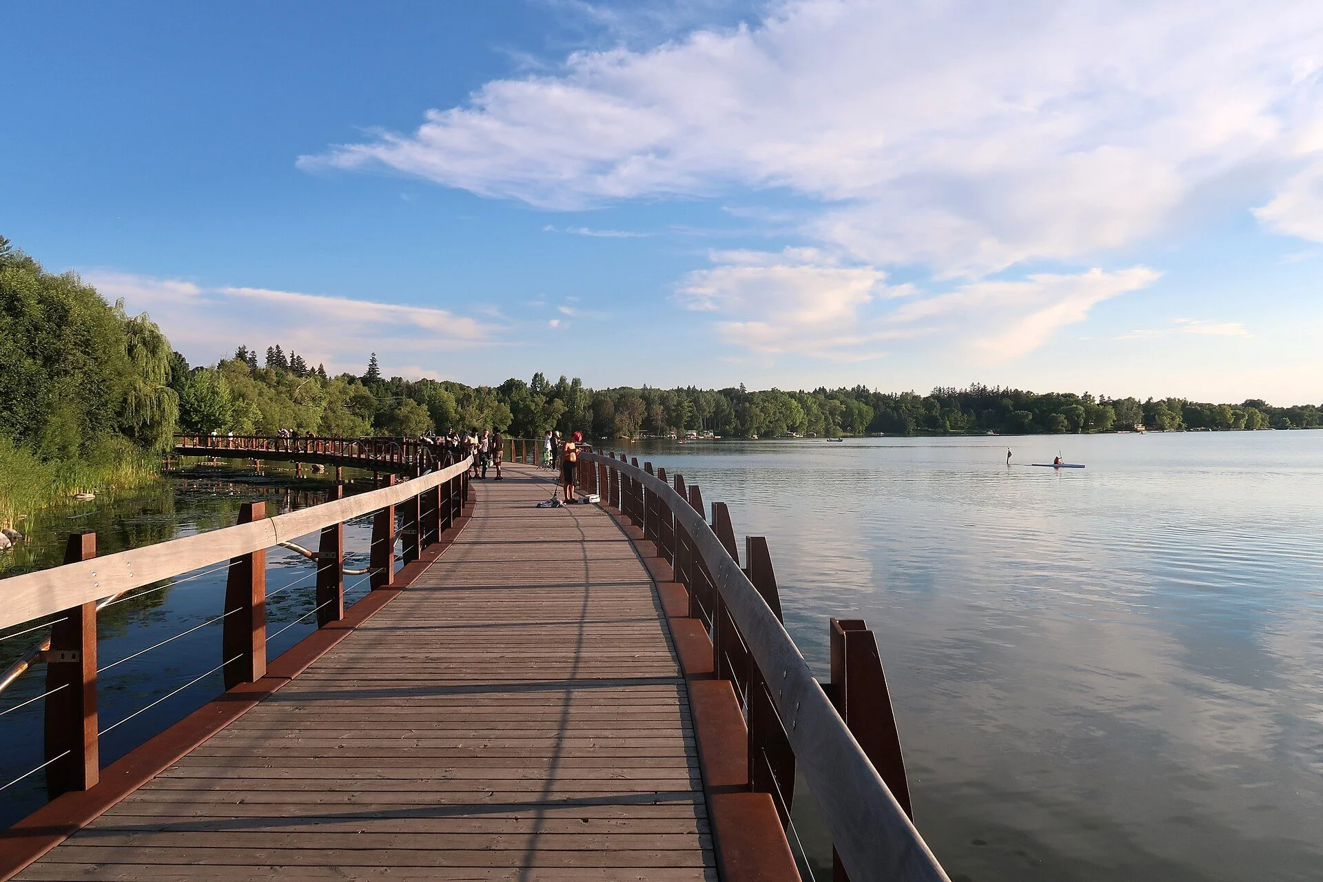 Wooden boardwalk along the shore of Lake Wilcox in Richmond Hill.