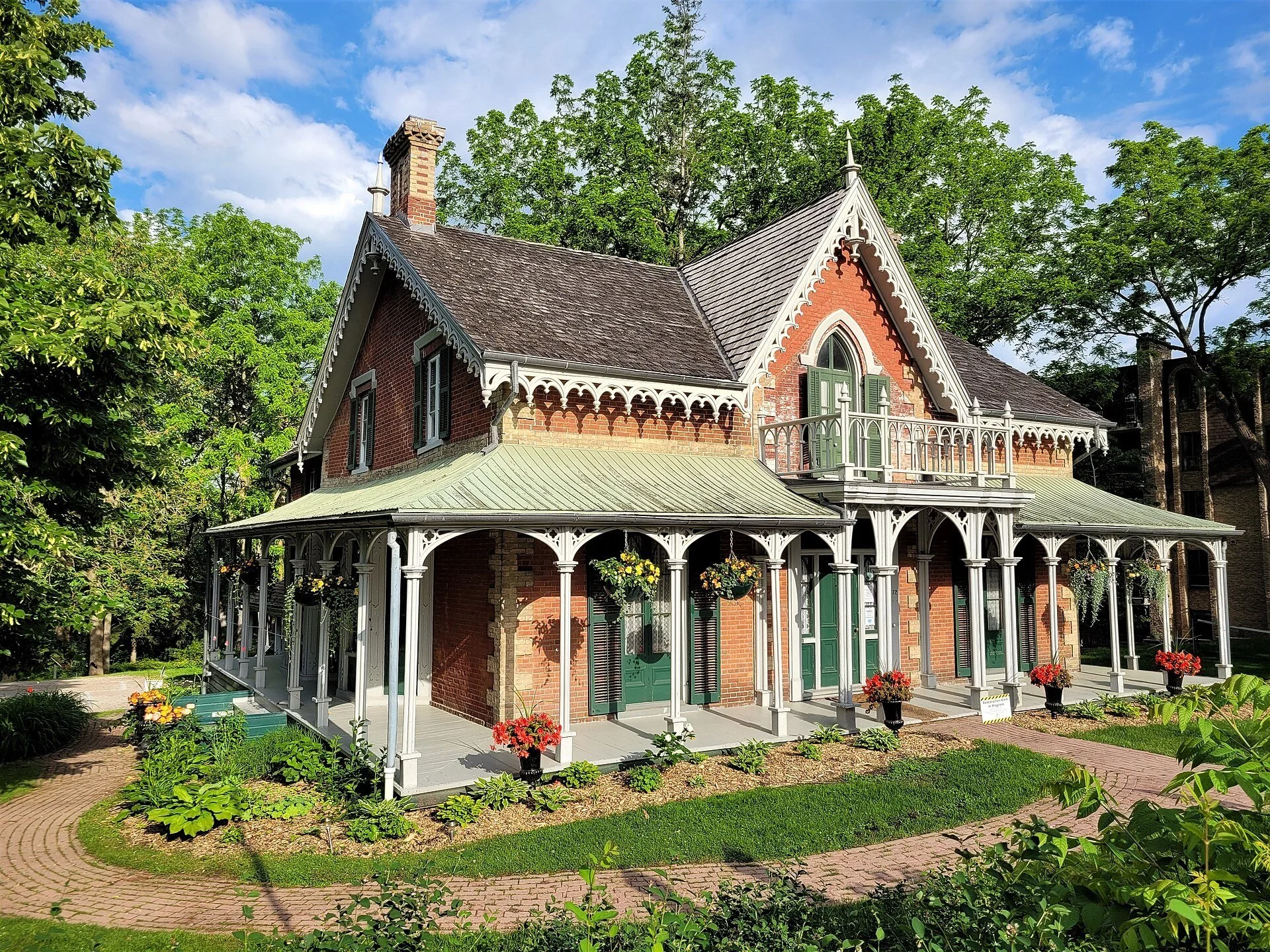 The Gothic Revival Hillary House, home of the Koffler Museum of Medicine, with its veranda and gardens in Aurora, Ontario.