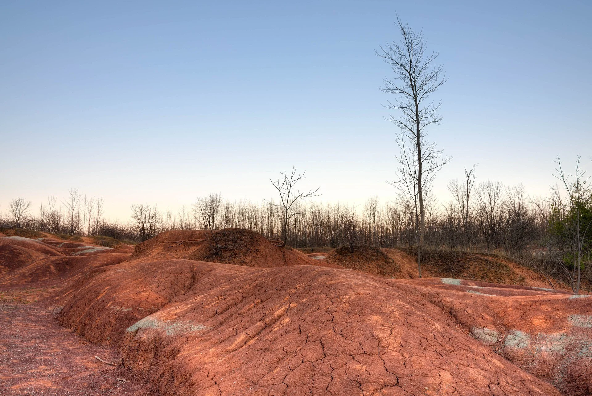 The red, rippled clay hills of the Cheltenham Badlands in Caledon, Ontario.