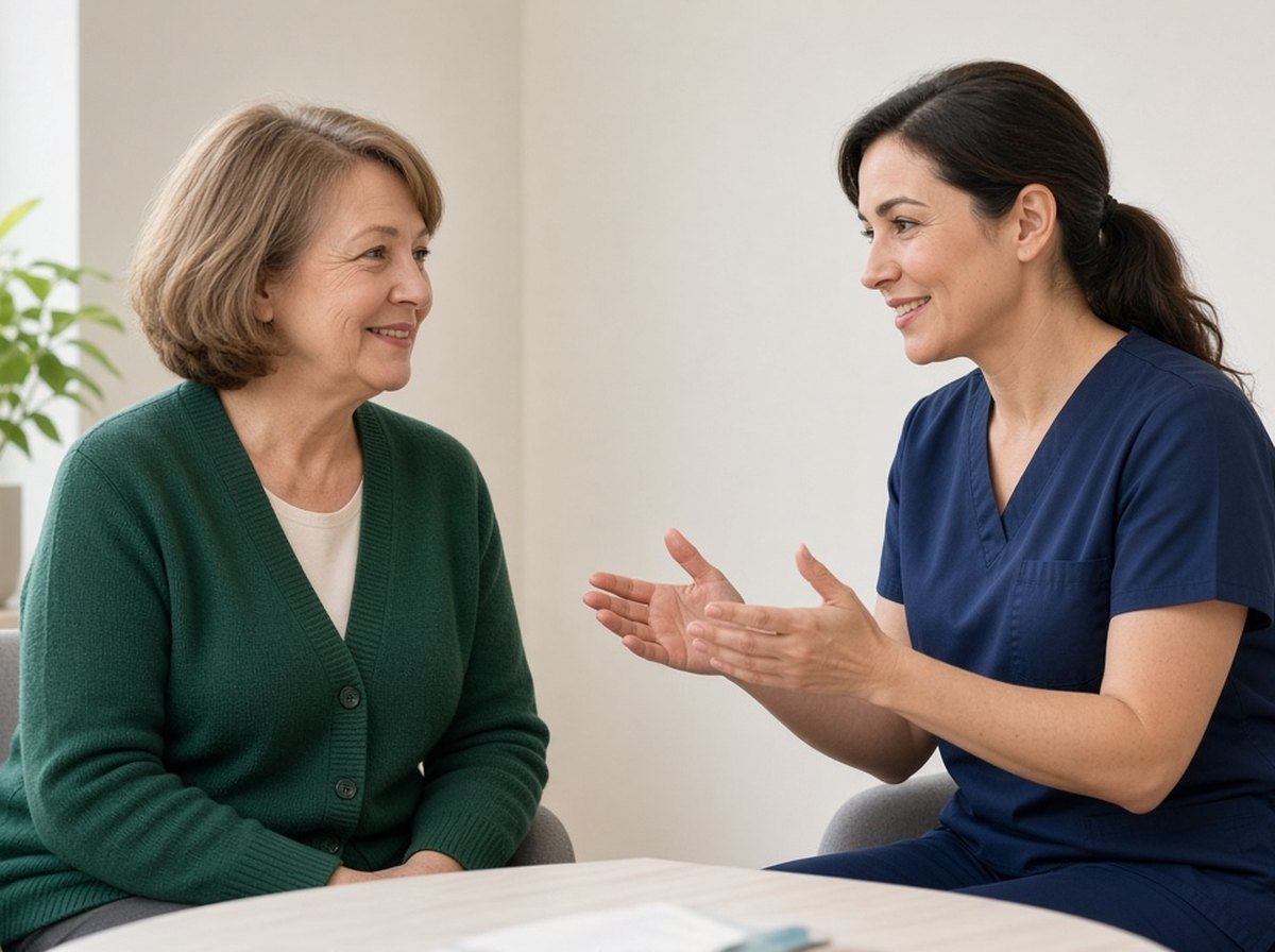A woman talking with a friendly imaging technologist in a calm hospital waiting area