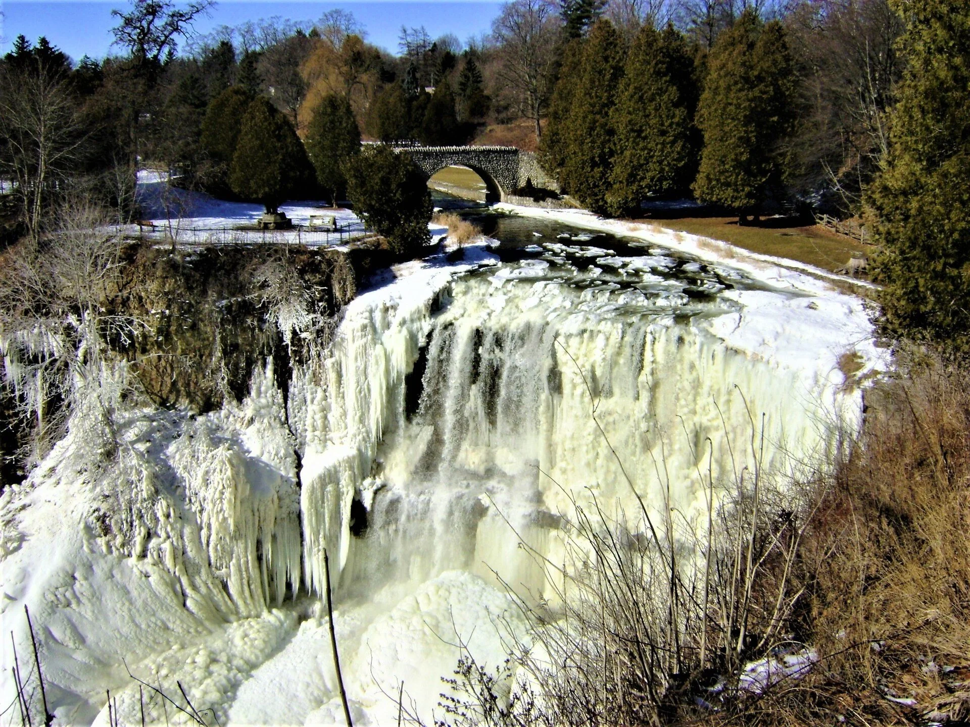 Webster's Falls partly frozen in winter in Spencer Gorge, Hamilton.