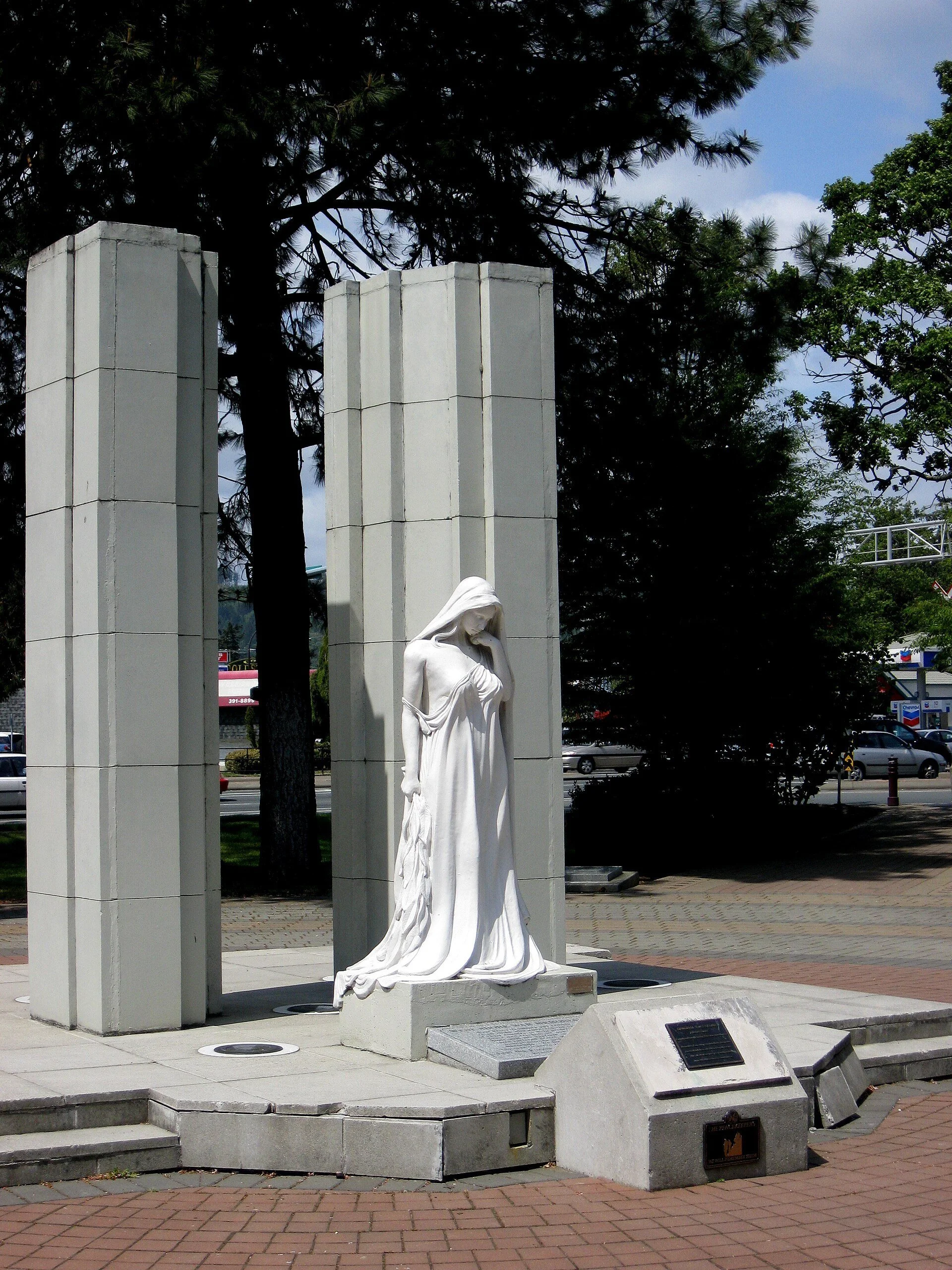 The white stone memorial and statue in Veterans Memorial Park in Langford, BC.