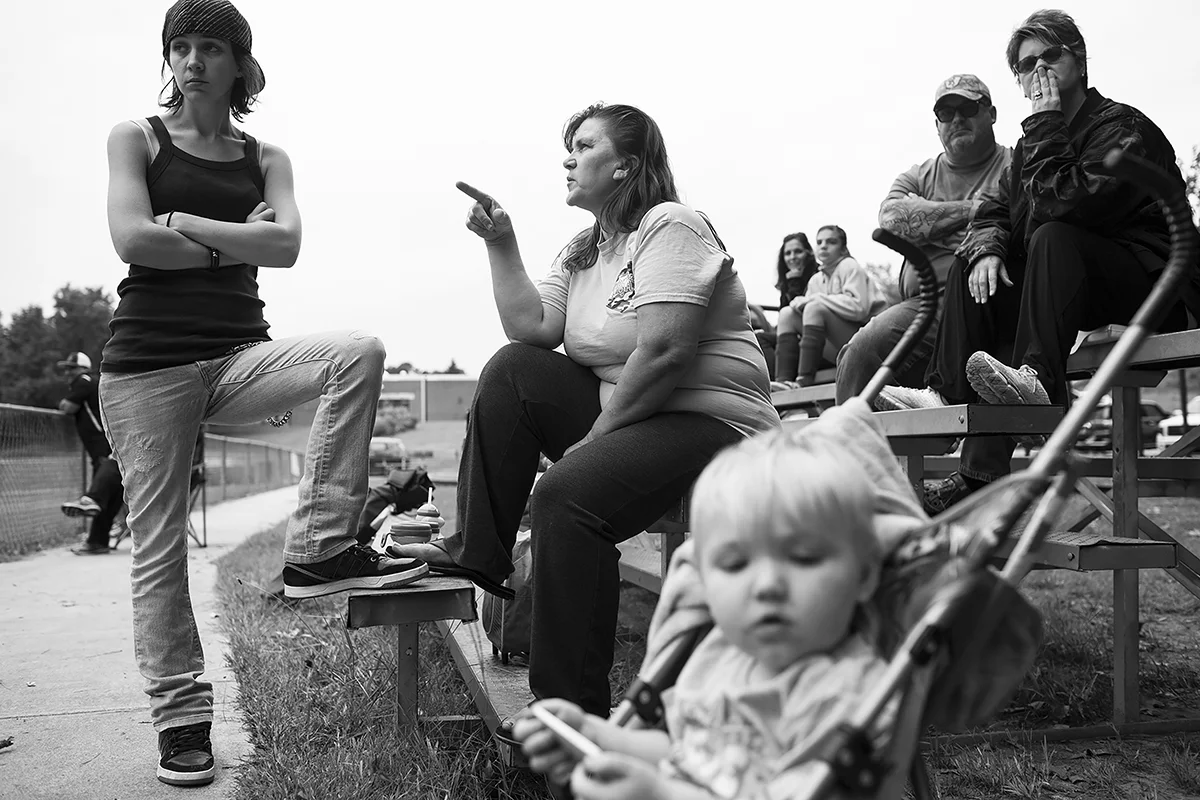  Argue Morgan talks to her daughter Arielle during their daughters softball game in Durham, North Carolina. Their two daughters Katana and Jazz do many activities together because of their similar age. 