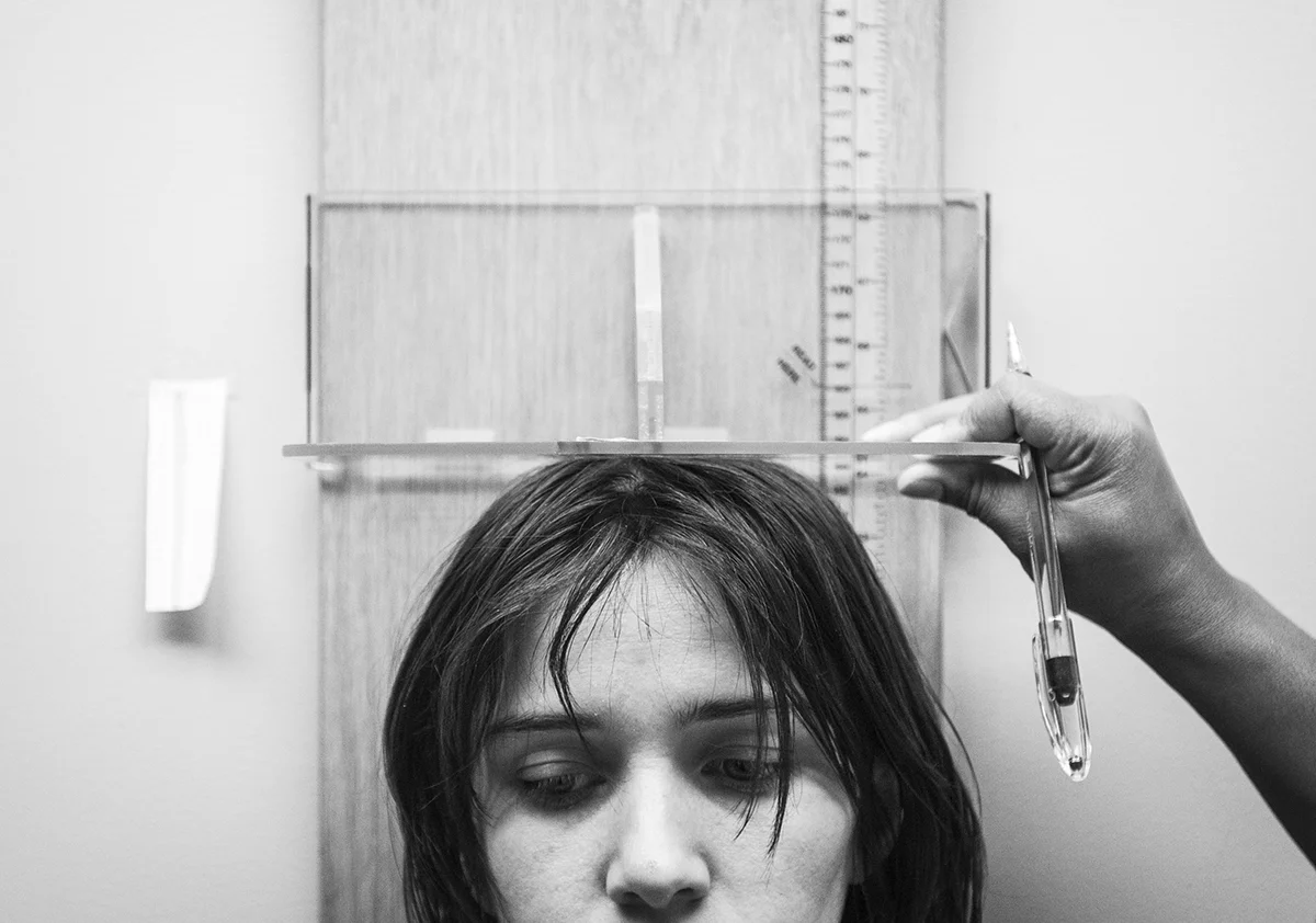  Arielle Morgan gets her height measured during a meeting to renew her WIC vouchers that she receives for her 2 year old son. October, 21, 2015. Durham, N.C. 