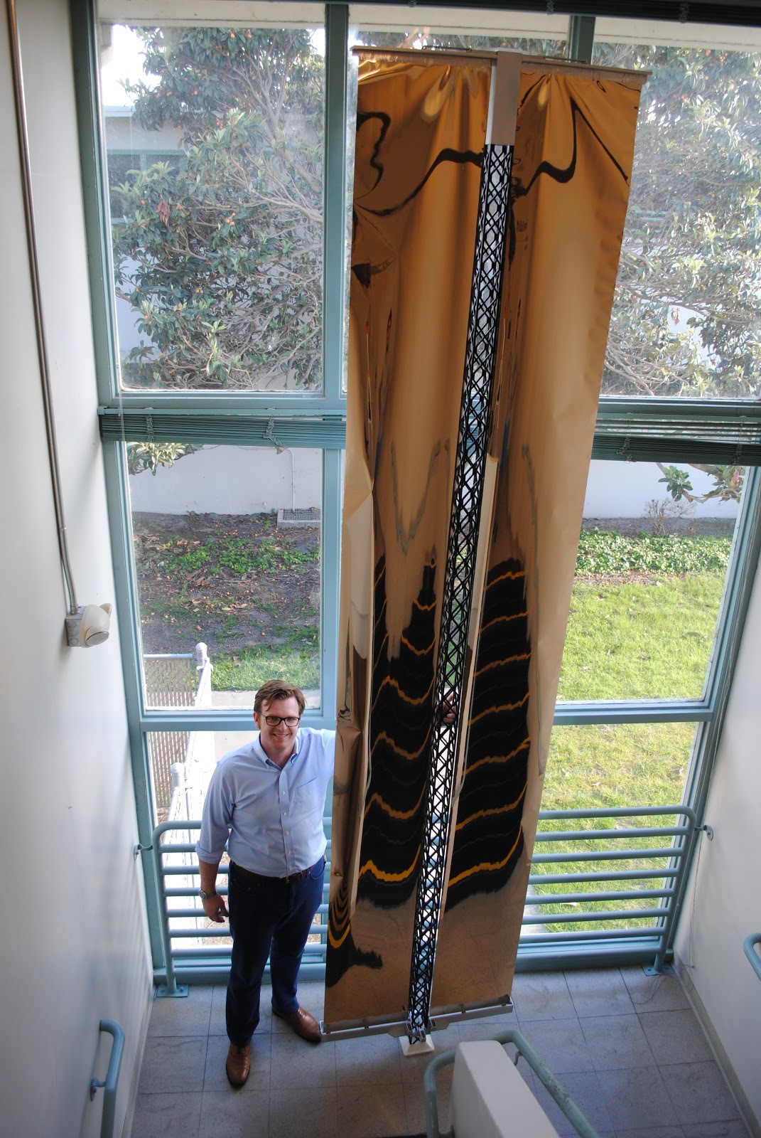 Image of subscale 3 meter mockup of an Archinaut-built solar array. Initial flight versions of Archinaut’s power system will be 10 meters long and deploy approximately 10 square meters of solar array surface area on each side, enabling the collection of multiple kilowatts of energy.