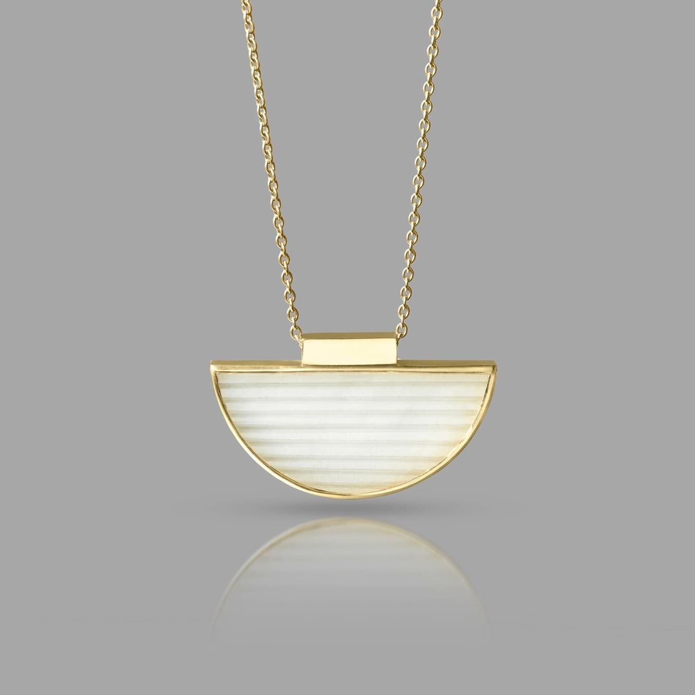 This beautiful white jade necklace found a new home recently-wishing it becomes part of many wonderful memories💫
.
Made with hand carved jade complemented by soft 18ct yellow gold with the signature grooves 🌟
.
#finejewellery #statementjewelry #hei