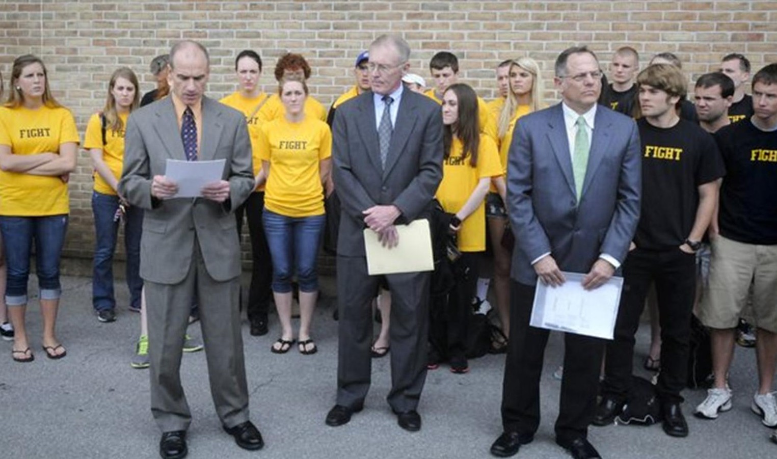 (Left to right): Bob Vasile, Tom Ecker, and Glenn Stephens, CROS representatives, hold a press conference in front of Biemesderfer Stadium.
