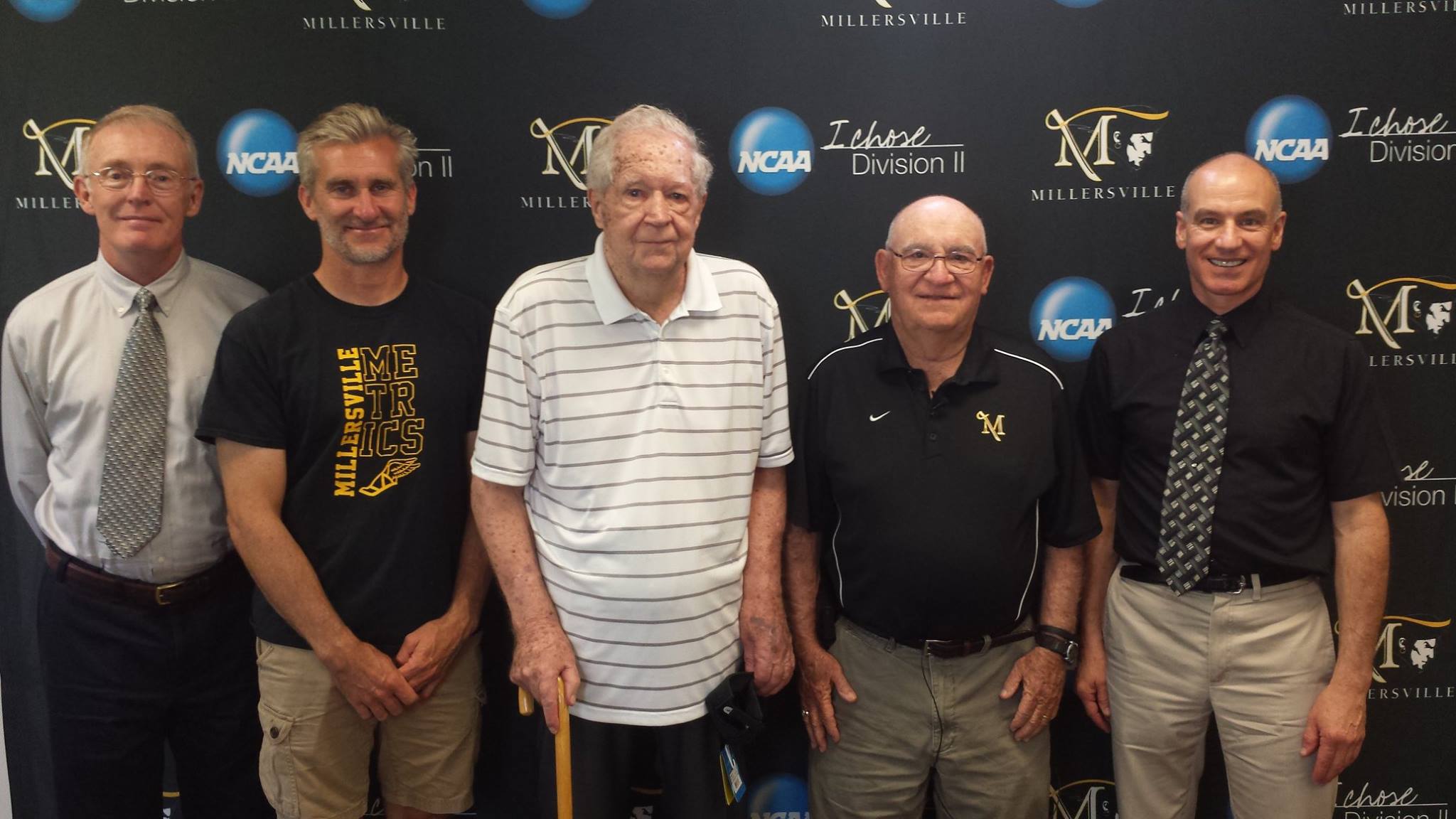 (Left to right) Tom Ecker (interviewer, All-American, and former MU runner), Andy Young (current coach), Art Hulme (founder and former coach of the cross country program and first track & field coach of the modern era), Cy Fritz (former MU cross country and track & field coach and MU's most successful coach of any sport), and Bob Vasile (interviewer and former MU runner)