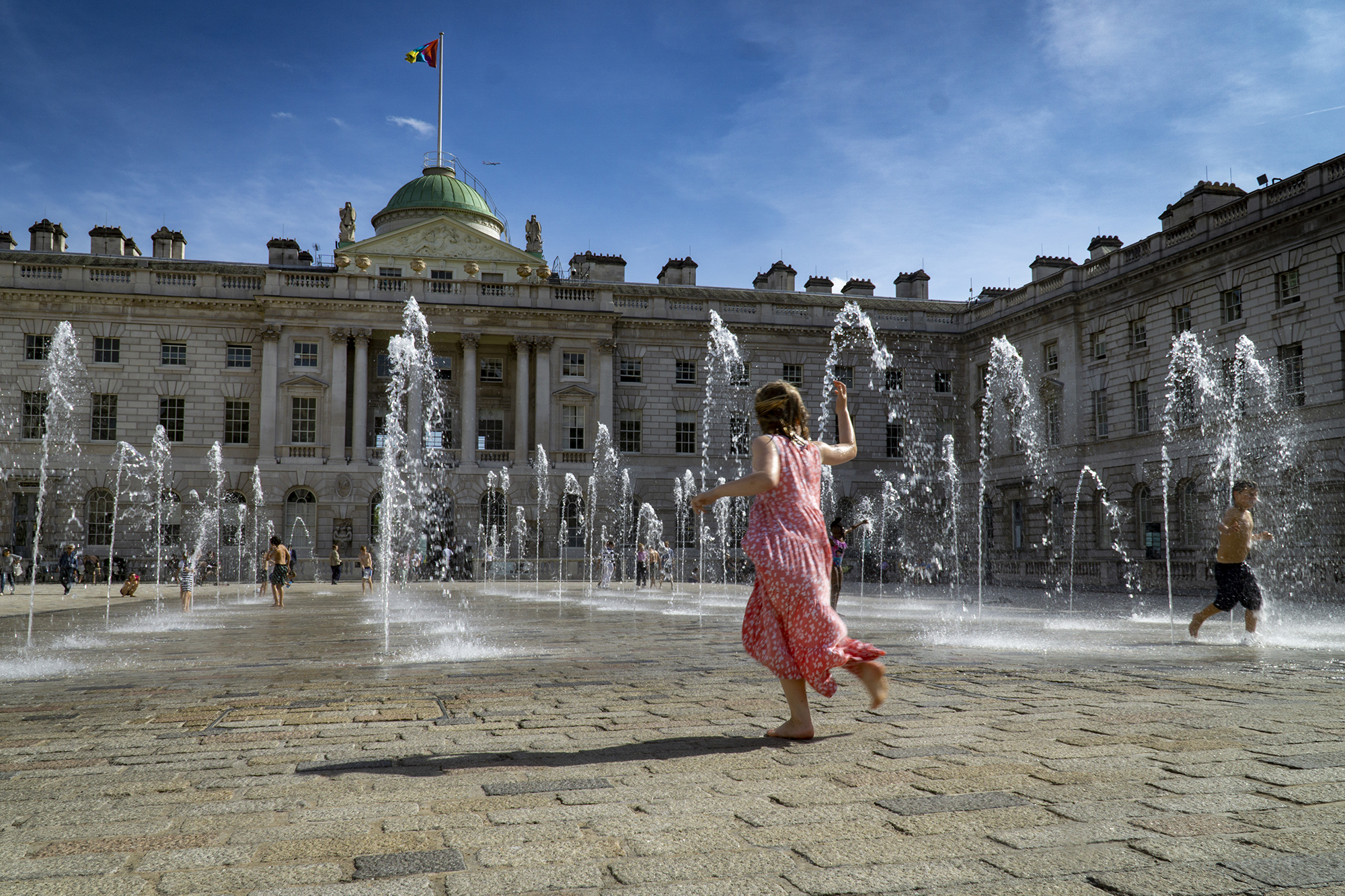 Kids at play in London fountain.