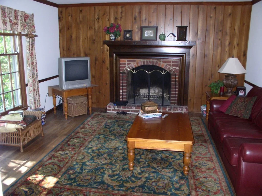 Family room and fireplace before