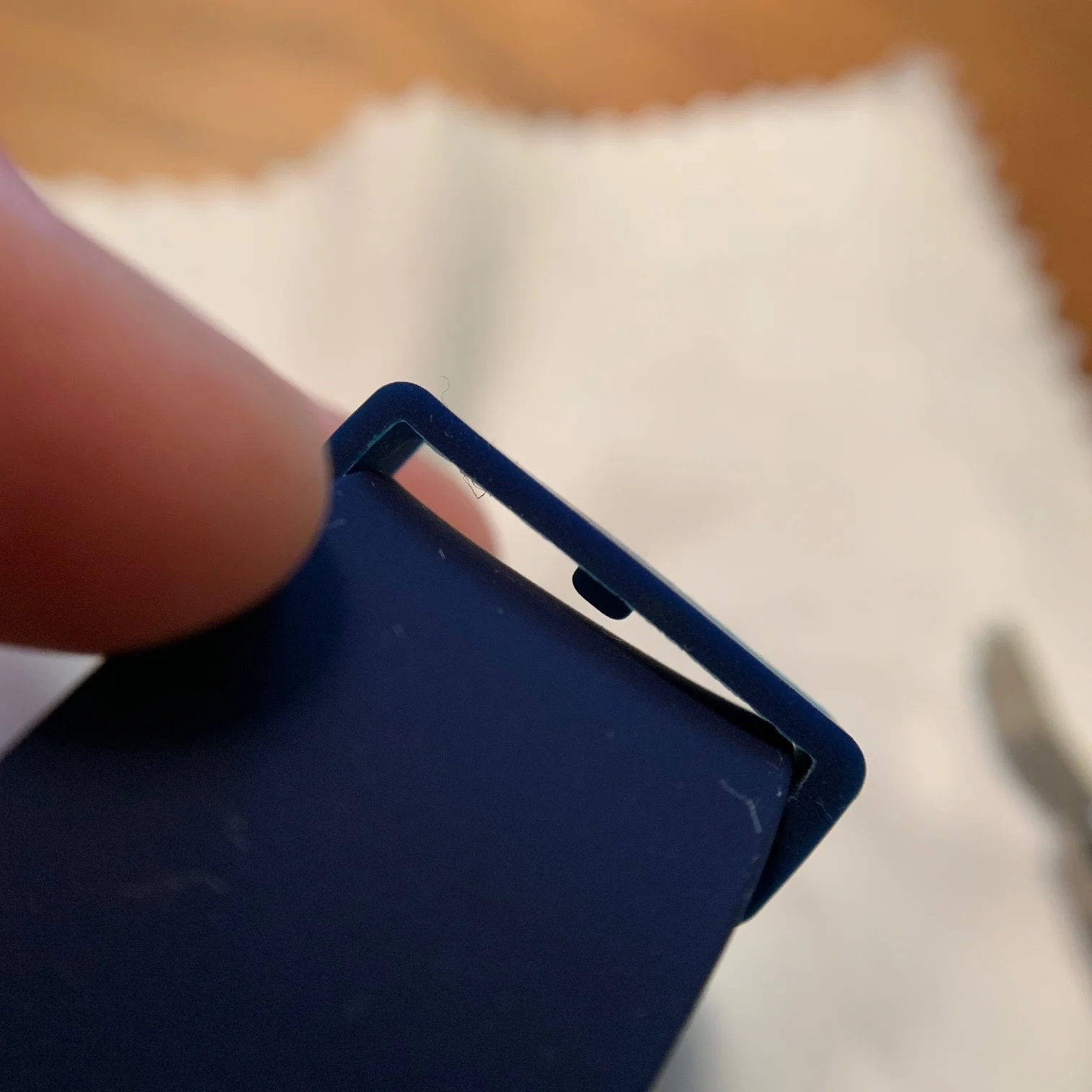 The little tab on the inside of the keepers fit perfectly into the tang holes and allow the keepers to stay in place and sit nice and flush.