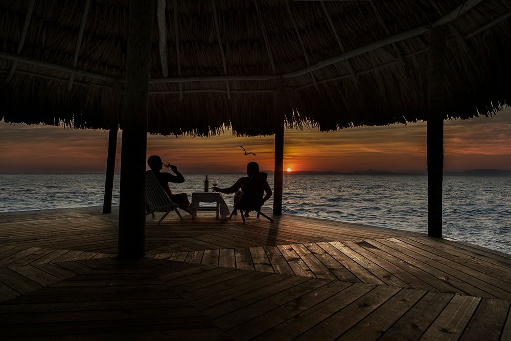 Copy of thatch caye wine at sunset on serenity point.jpeg