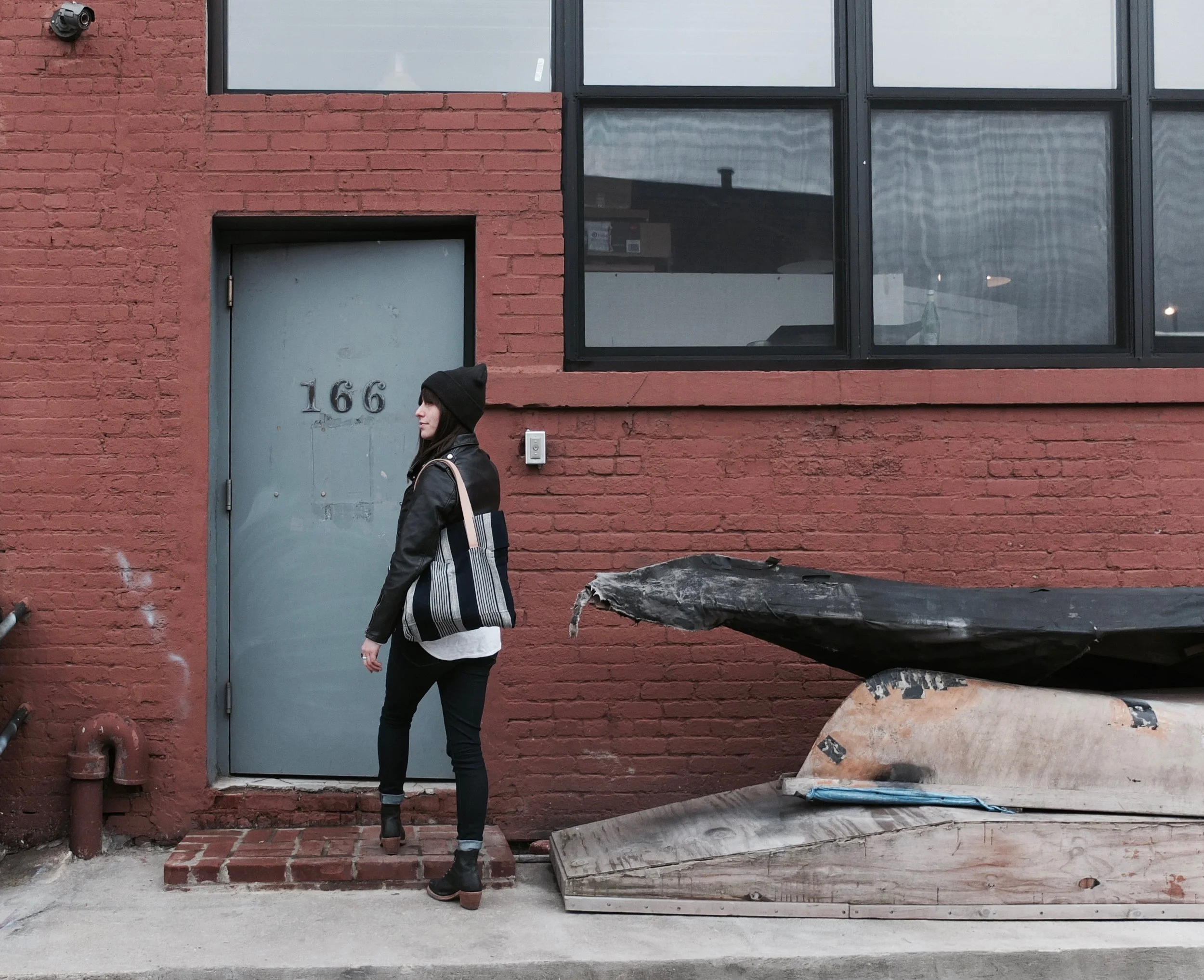 Anna Wingfield outside her studio carrying her Five | Six Textiles Tote .
