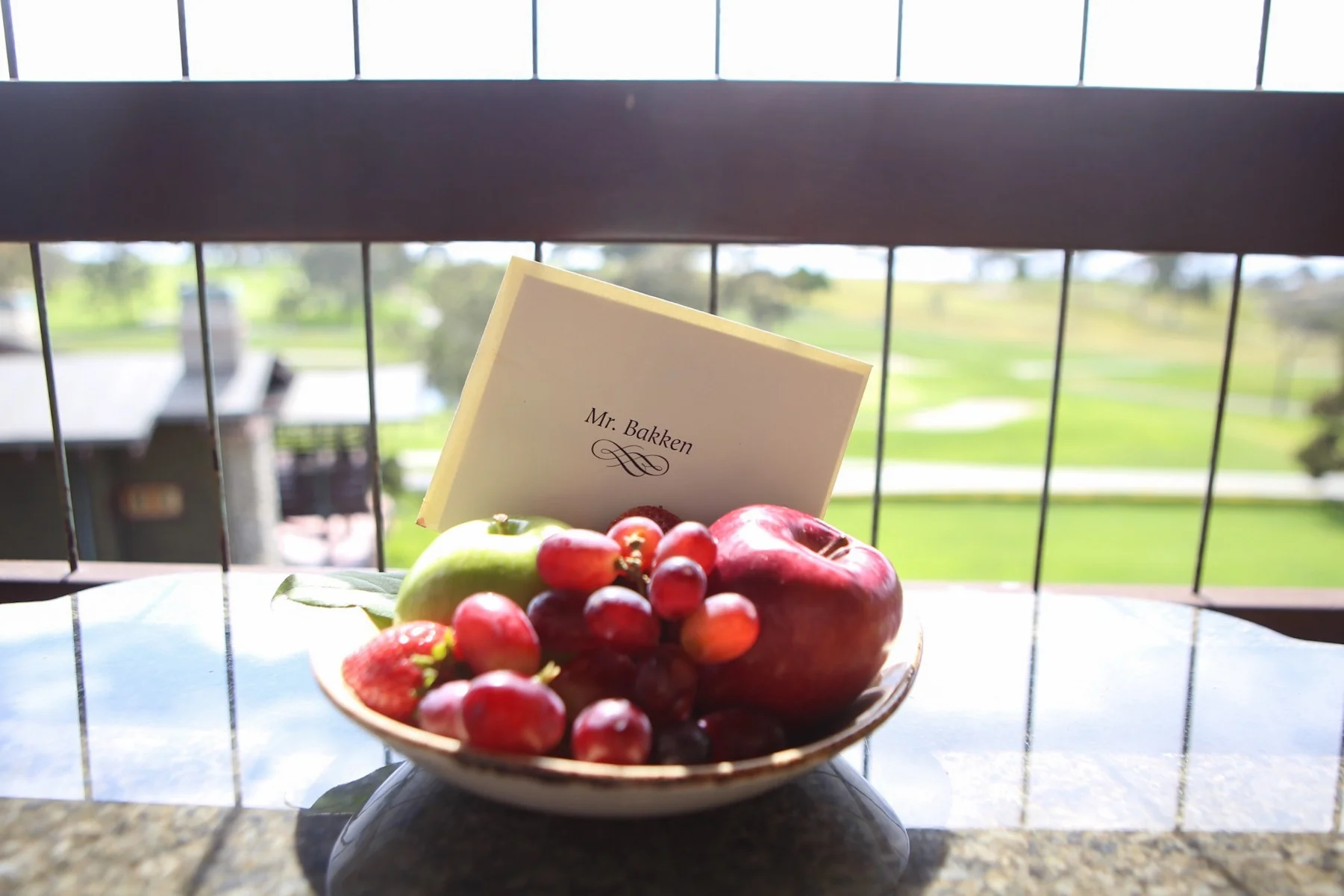 A welcome note and fruit basket from The Lodge at Torrey Pines. 