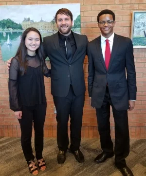 Pictured (from left to right): Ginny Paige Velasquez, Jonathan Schallert (Music Director), Jeffrey Huddleston II