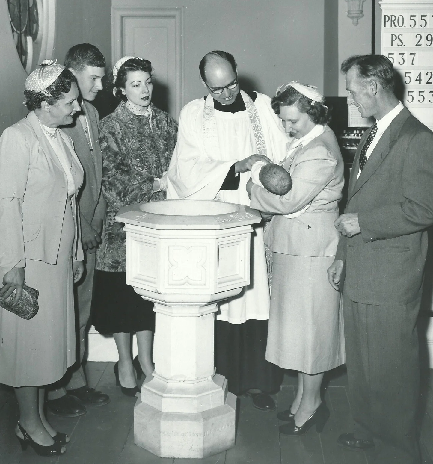 The Rev. Ken Morris celebrating a baptism at St. Stephen's in the 1950s.