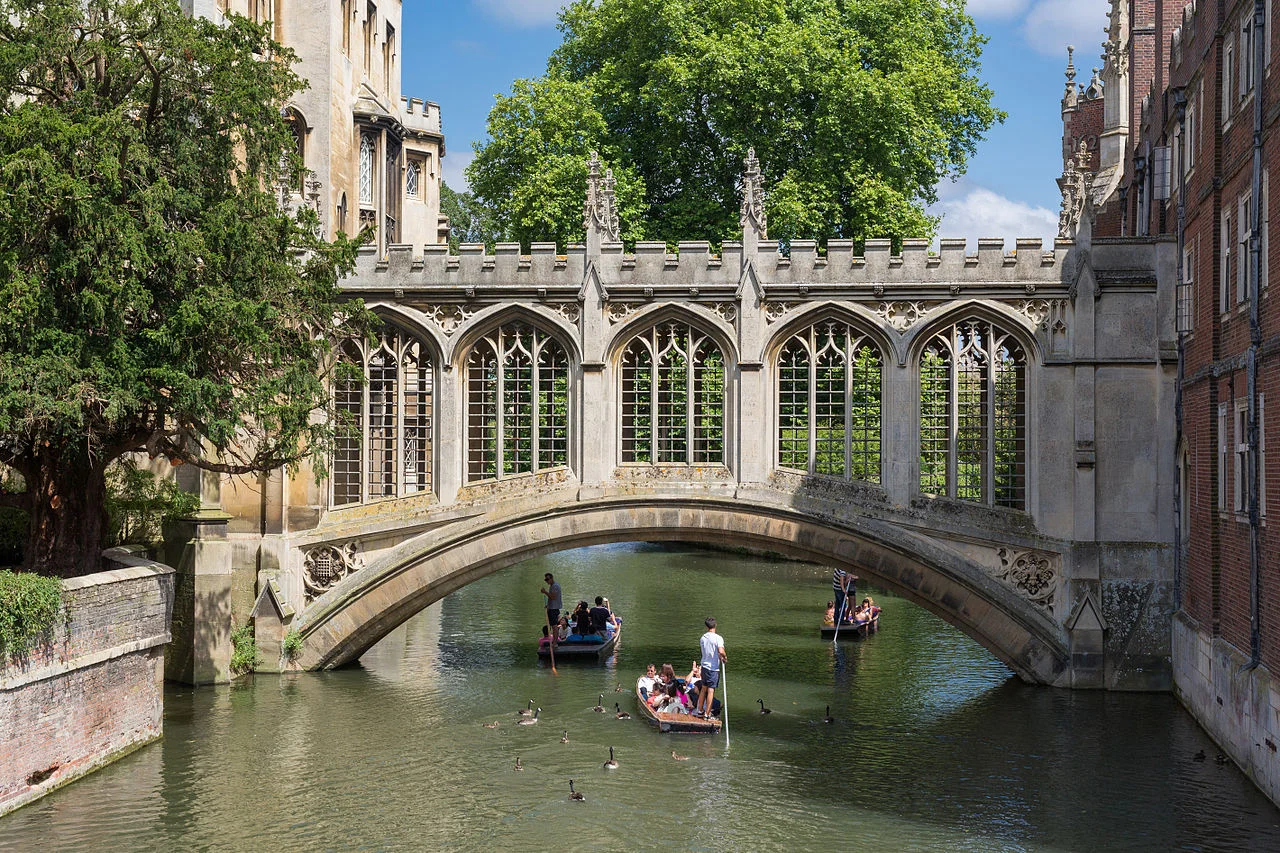 Punting under the Bridge of Sighs on the River Cam in Cambridge