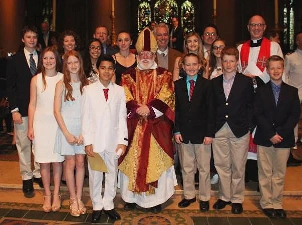 Our group of newly-confirmed and received in the Cathedral of St. John the Divine, with the Bishop of New York and our Rector, Fr. Nils Chittenden.
