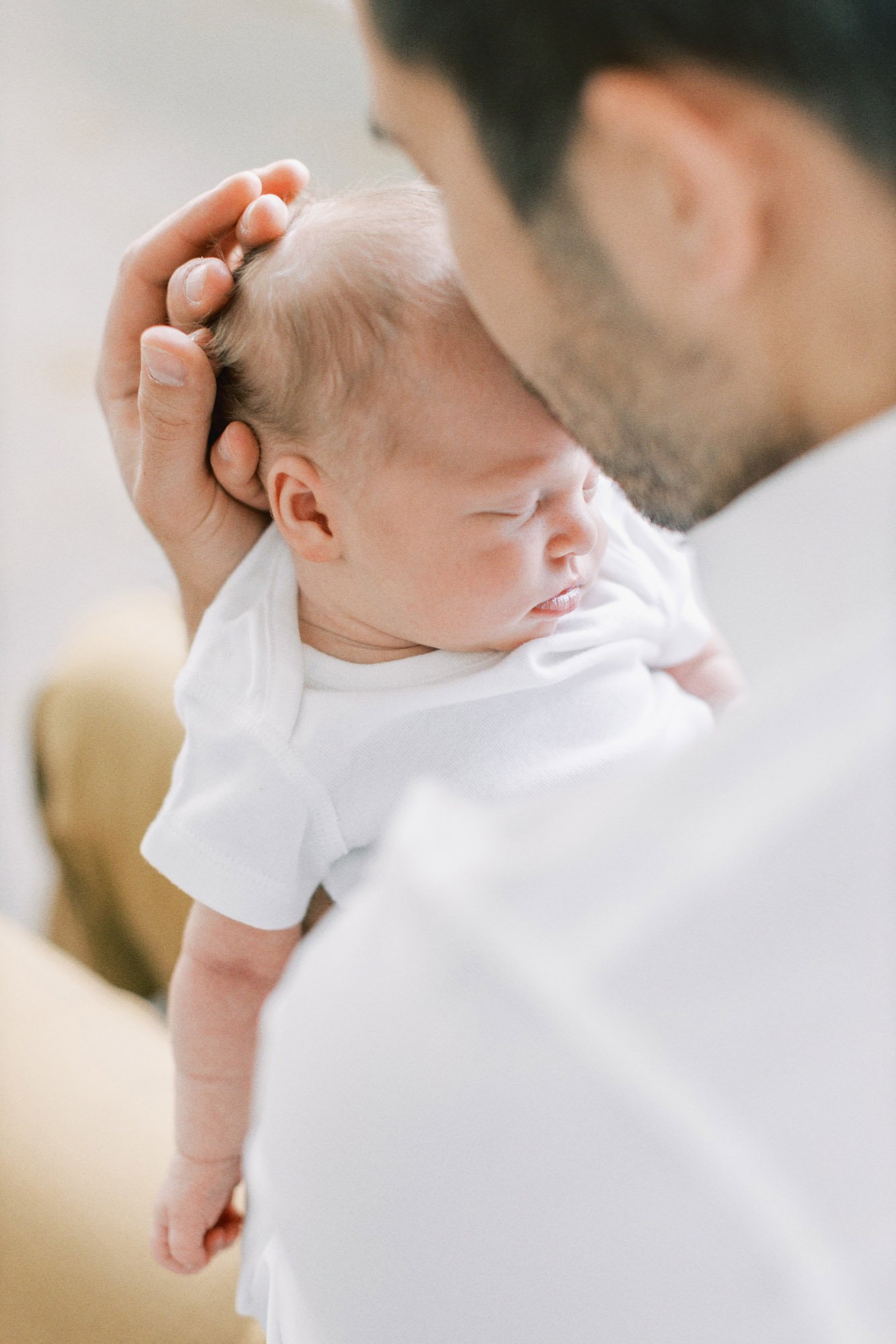 newborn-in-daddys-hands.jpg