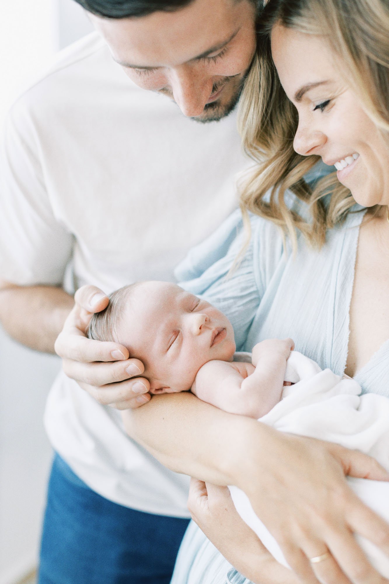 dads-hand-on-newborn.jpg