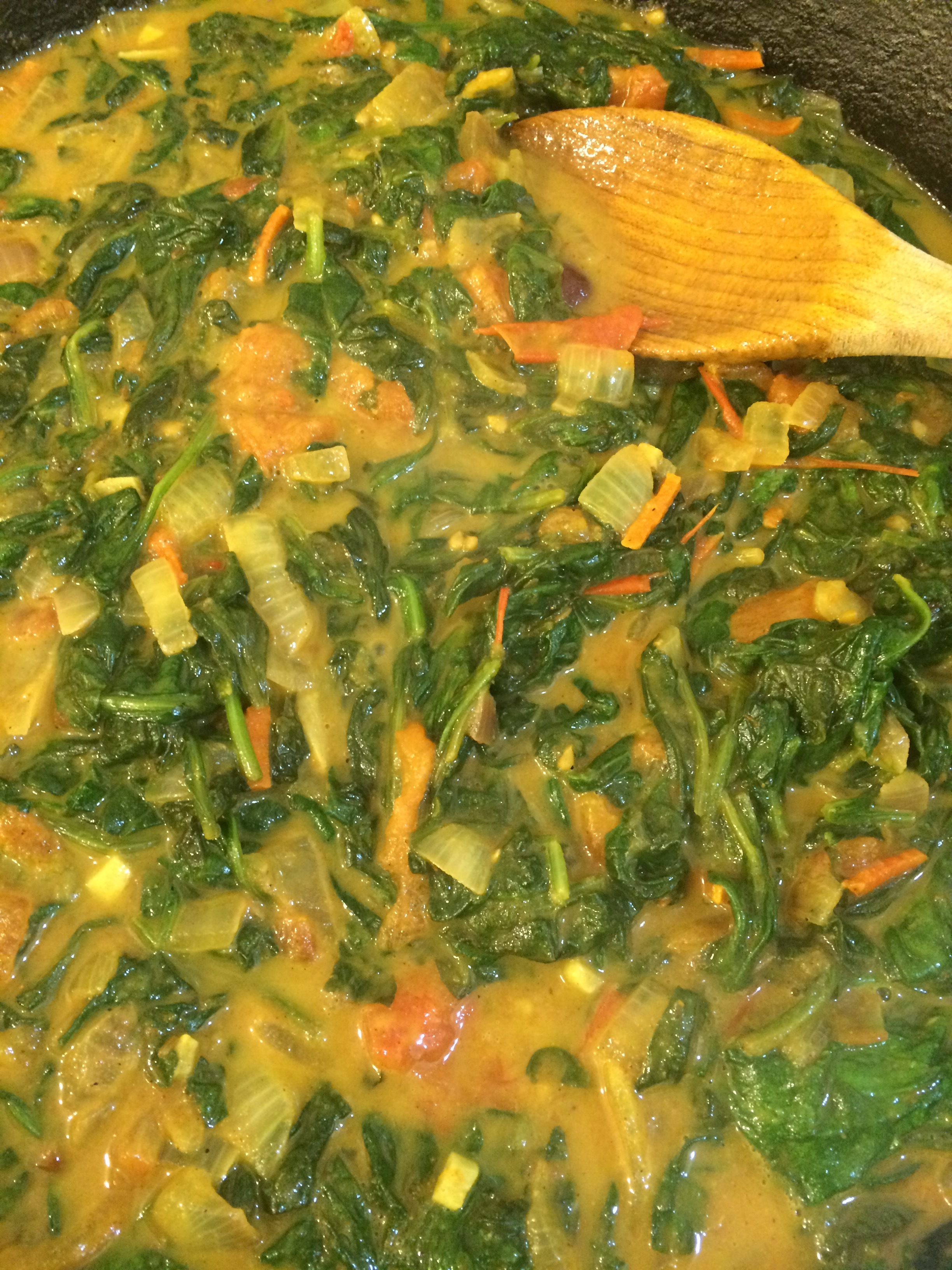 Add coconut milk, simmer, adjust seasoning .