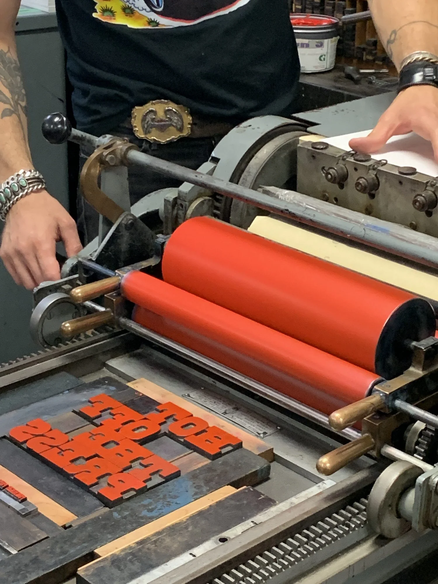 Inking-up the rollers of the Vandercook proofing press