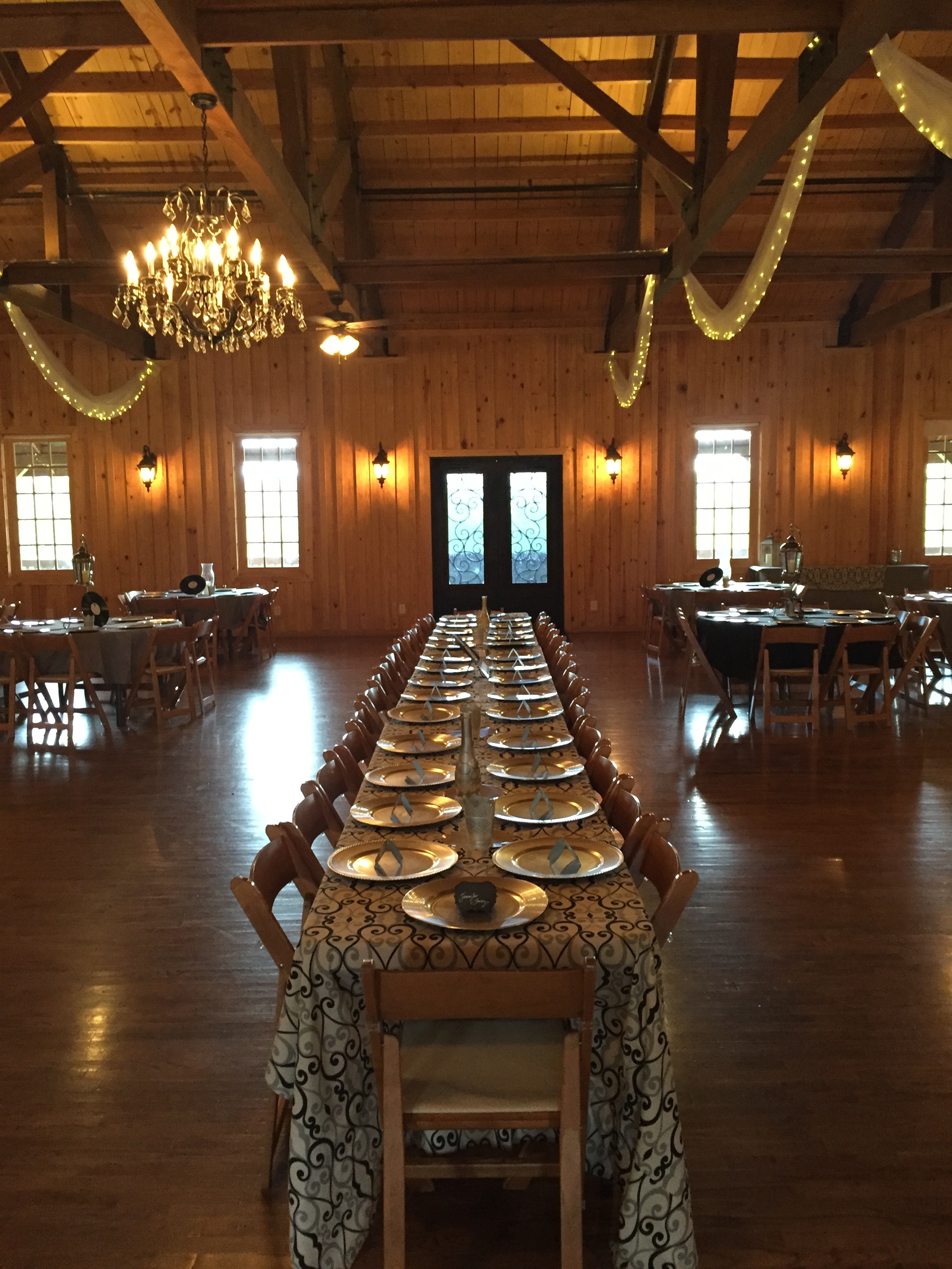 Rachel + Mike's head table featured custom linens made by Trademark Weddings. 