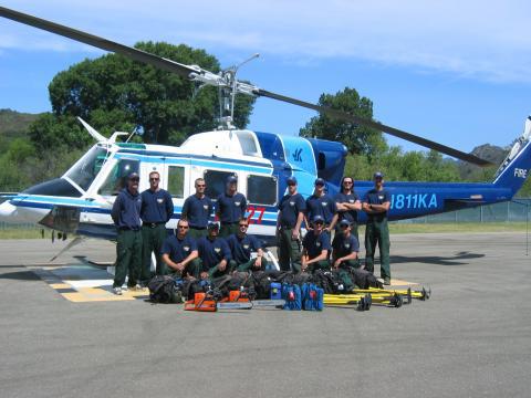 Thomas Coyne, Top left row center, left of the red "27, hands behind back