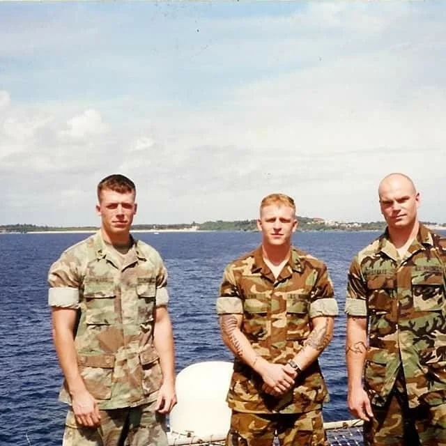 Instructor/Developer Adam Lynn, center