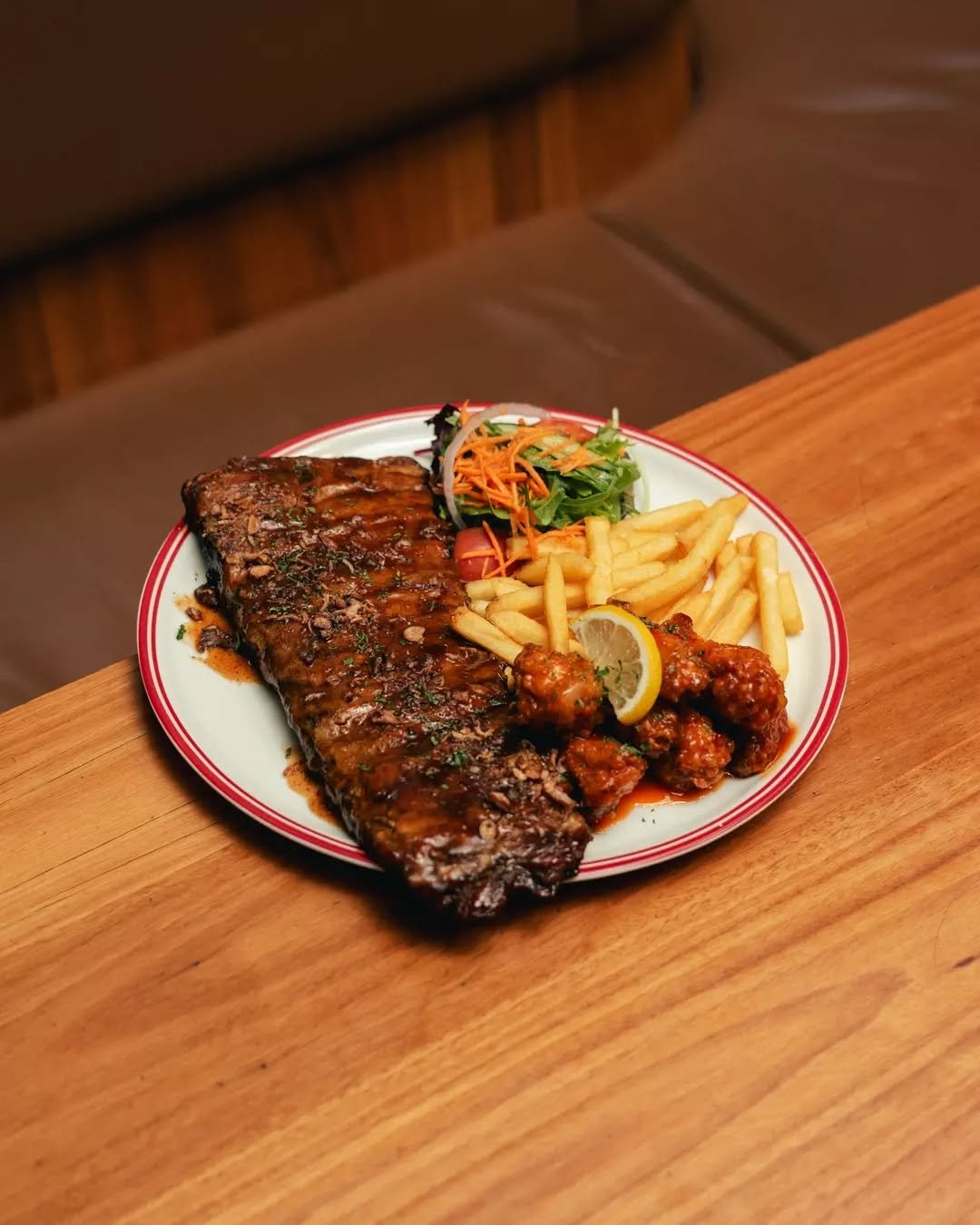 Your Tuesday Pork Ribs special with a side of buffalo chicken wings? Don't mind if we do!

Choose from Captain Morgan Spiced Rum, Sticky Maple BBQ or Spicy for your choice of sauce, and add wings for an extra $5&nbsp;💪