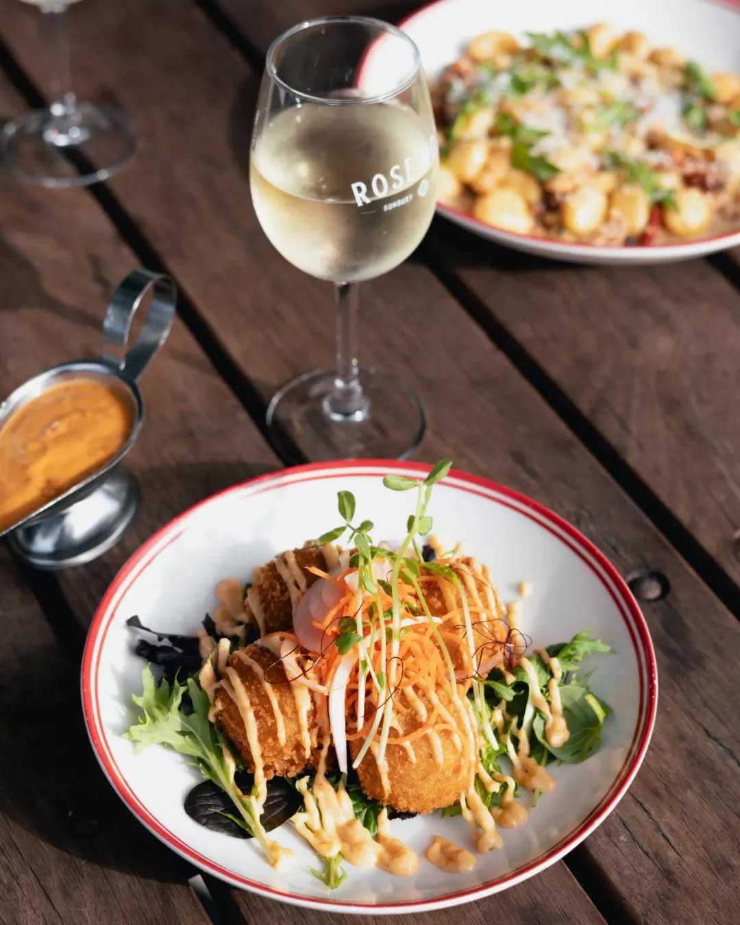 Our new Nasi Arancini is here ✨

Golden rice balls, melty mozzarella, satay sauce, chilli mayo, pickled veggies, coriander, lime + parmesan. What more could you want!