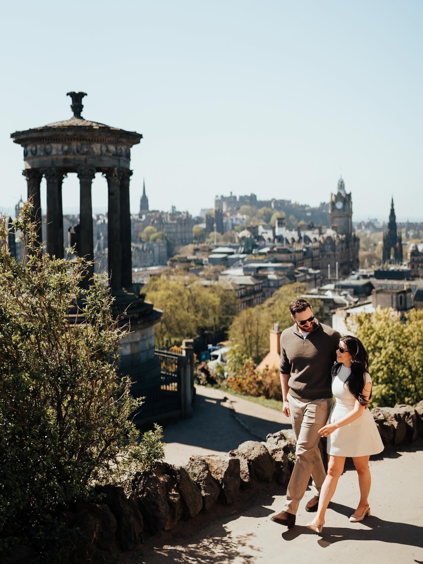 I had the absolute best time with Robyn and Neil for their pre-wedding shoot in sunny Edinburgh. We couldn&rsquo;t have asked for a more perfect day to wander through Princes Street Gardens and take in the views from Calton Hill.
Robyn and Neil were 