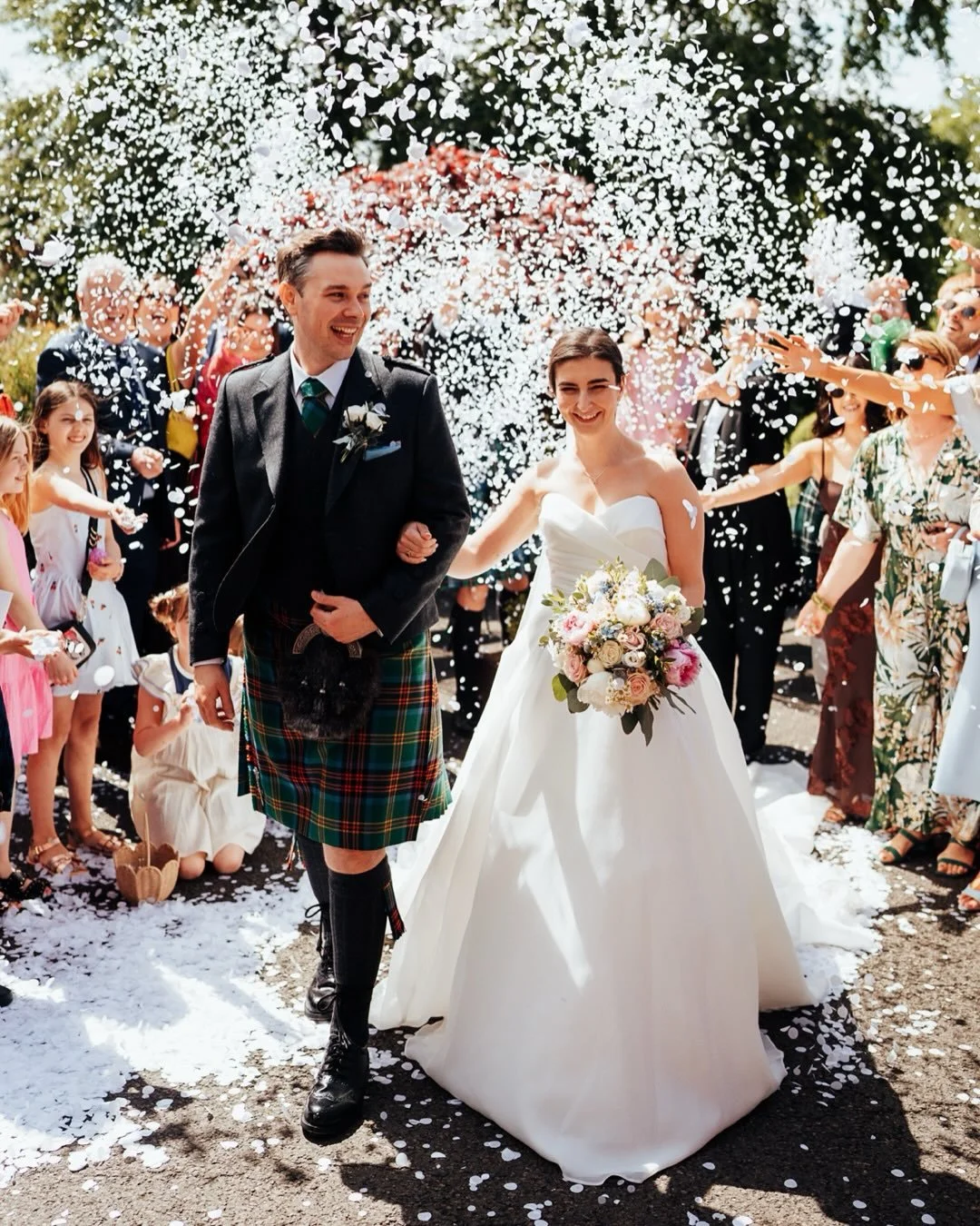 The sun was absolutely scorching at Garvock House this past weekend, but Zoe and Liam kept it totally cool with the most relaxed, chilled-out vibe you could imagine.
There is nothing quite like a summer wedding where the energy is high and the drinks