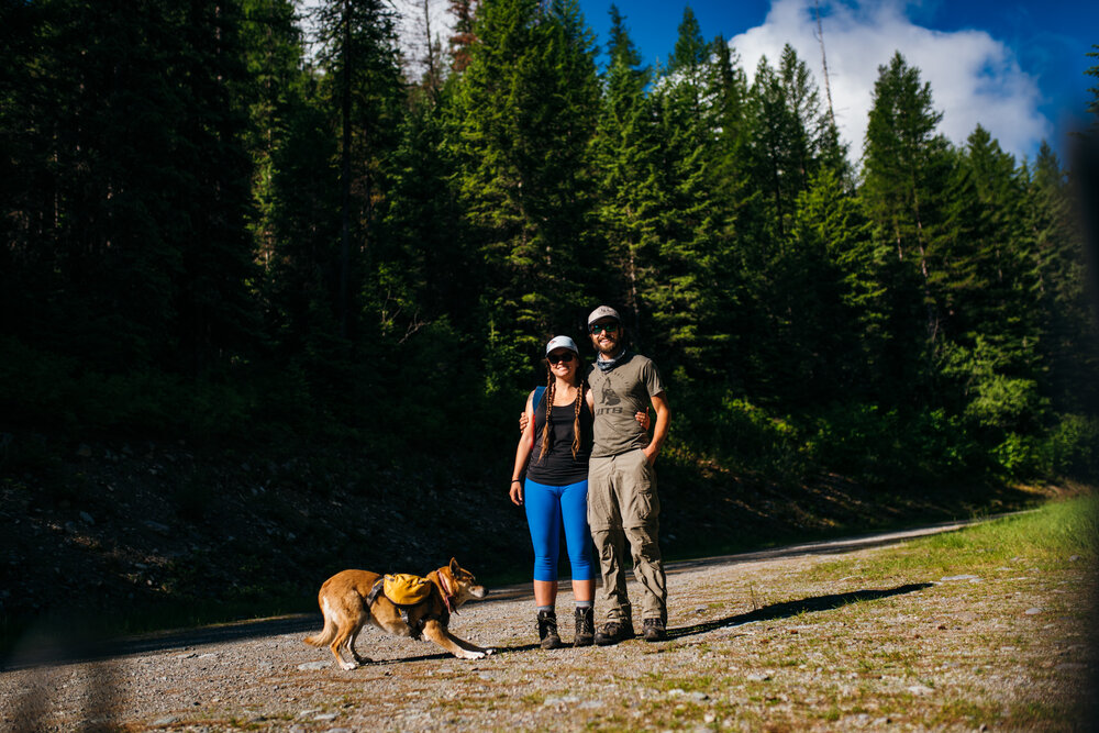  Holly &amp; I at the trailhead with the pup who was less than willing to join us for the photo op. We tried to get it multiple times &amp; she wasn’t having it. 