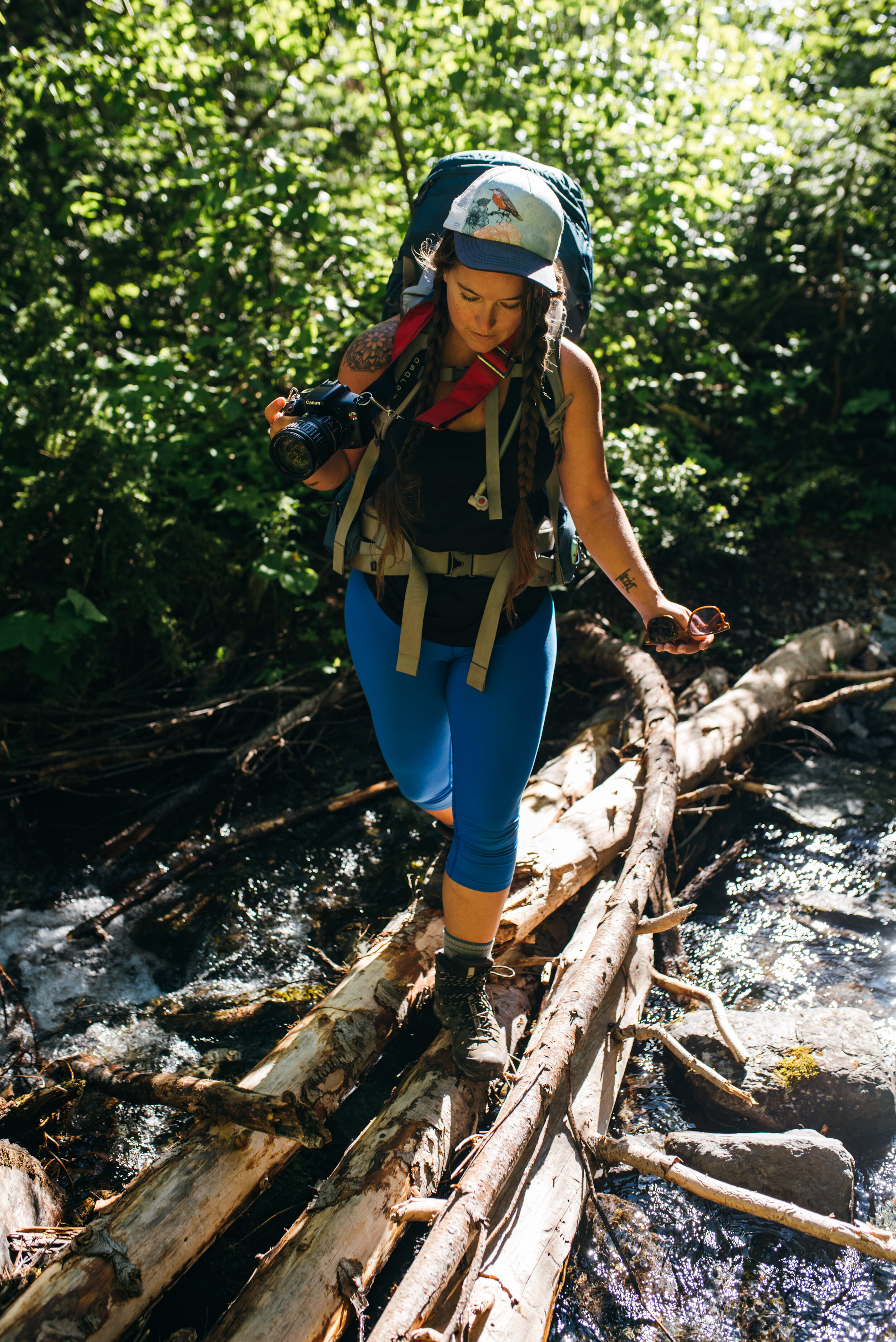  Holly C. Priestley crosses the stream like a pro, even pausing to take a couple photos midway through. 