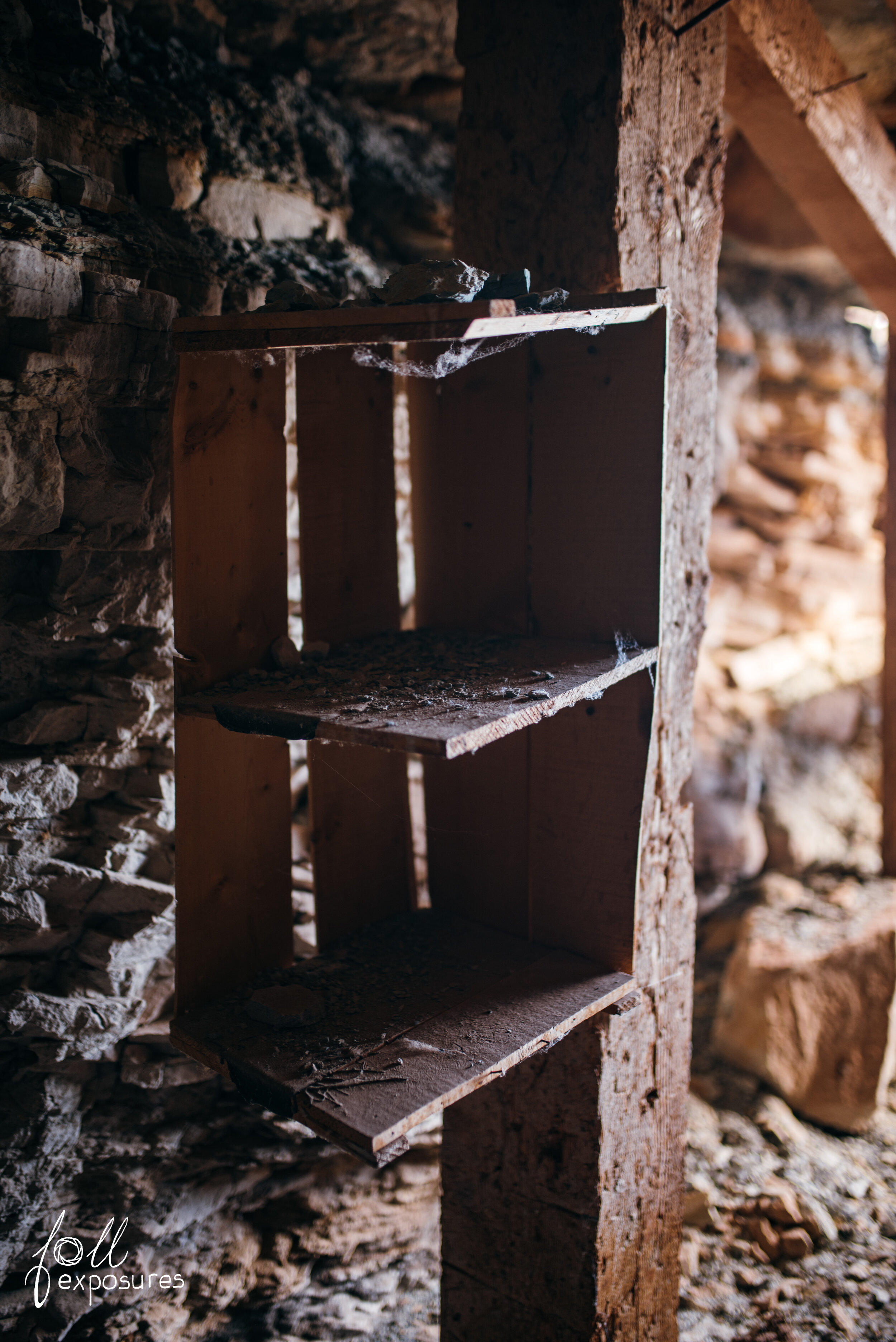  Rough hewn shelf tacked onto a mine shaft support beam. 