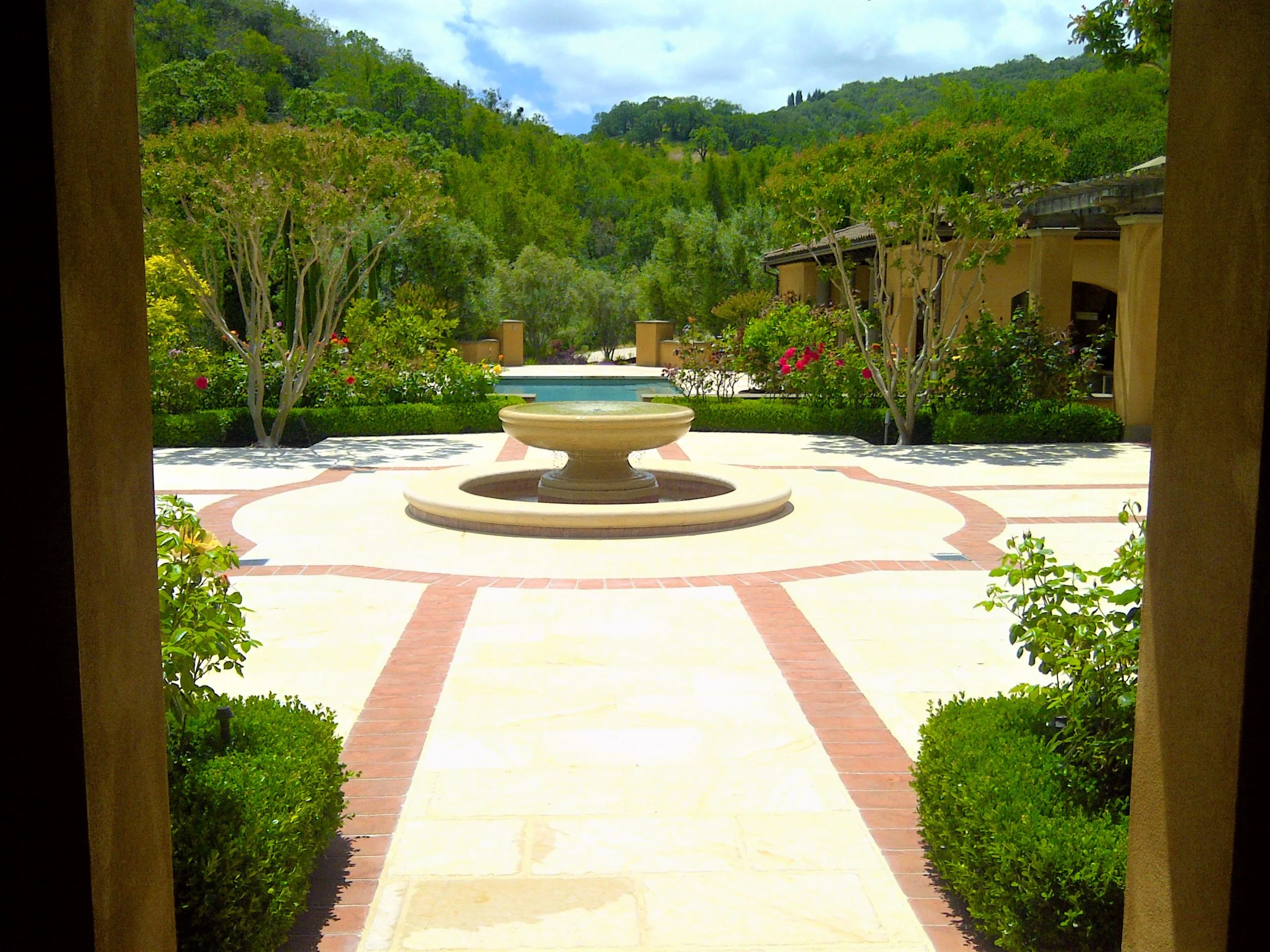 stone patio brick banding reyes landscape construction.jpg