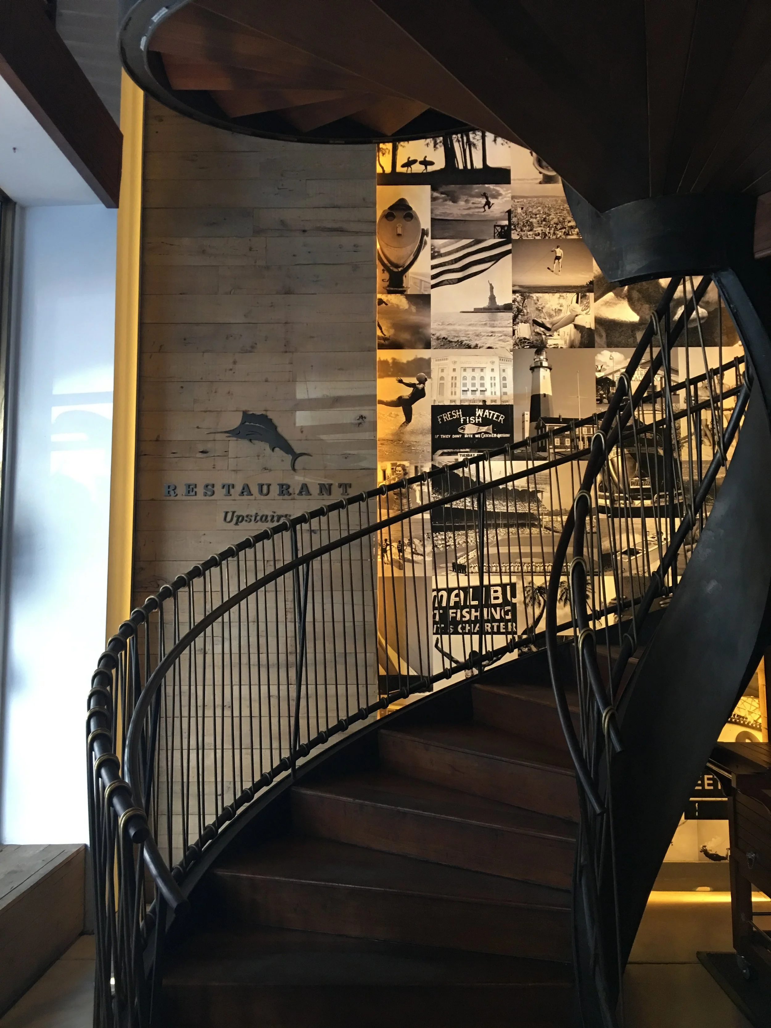 Photo collage welcoming patrons at the restaurant entrance on 5th Avenue, NYC