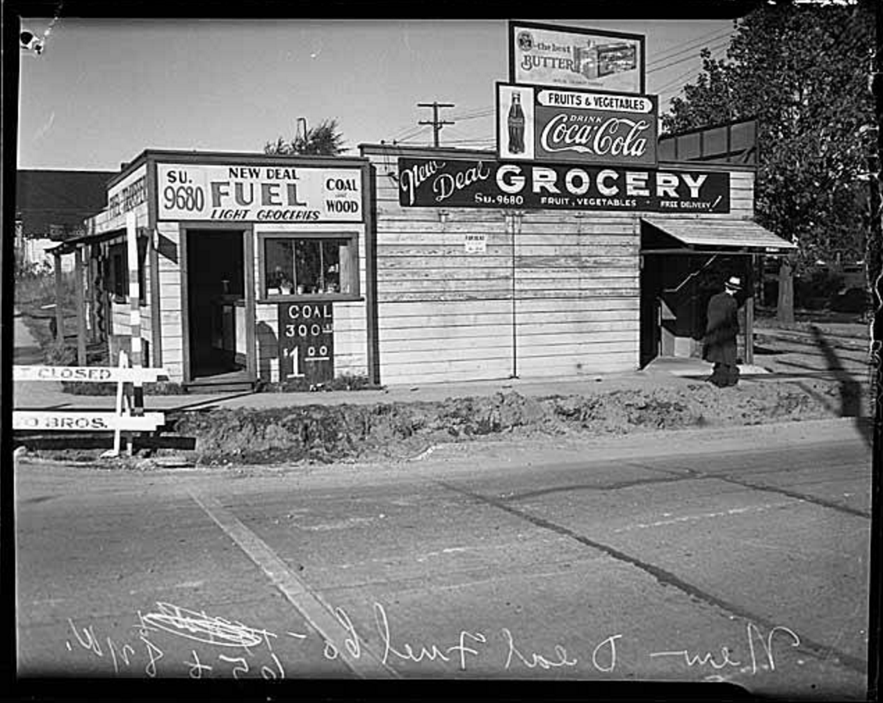 Perhaps our bottle was purchased at New Deal Fuel. This little grocery store was located at the corner of 65th & 8th Ave NW , a short walk from Drew and Jacob's house. This photo was snapped in 1935. Credit: Museum of History & Industry