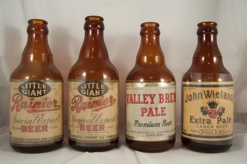 Steinie style bottles from the 30's, including Rainier Special Export Beer. Steinie bottles were designed to mimic familiar import beer bottle shapes. 
